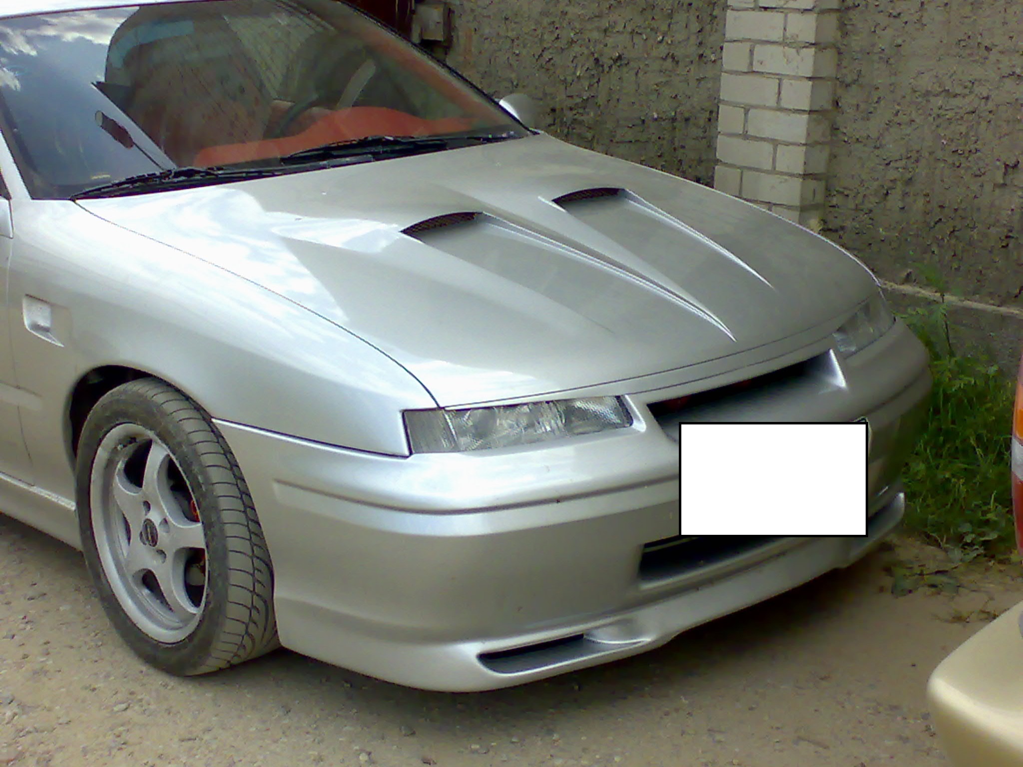 Priekinių žibintų uždengimas OPEL CALIBRA (1989-1997)