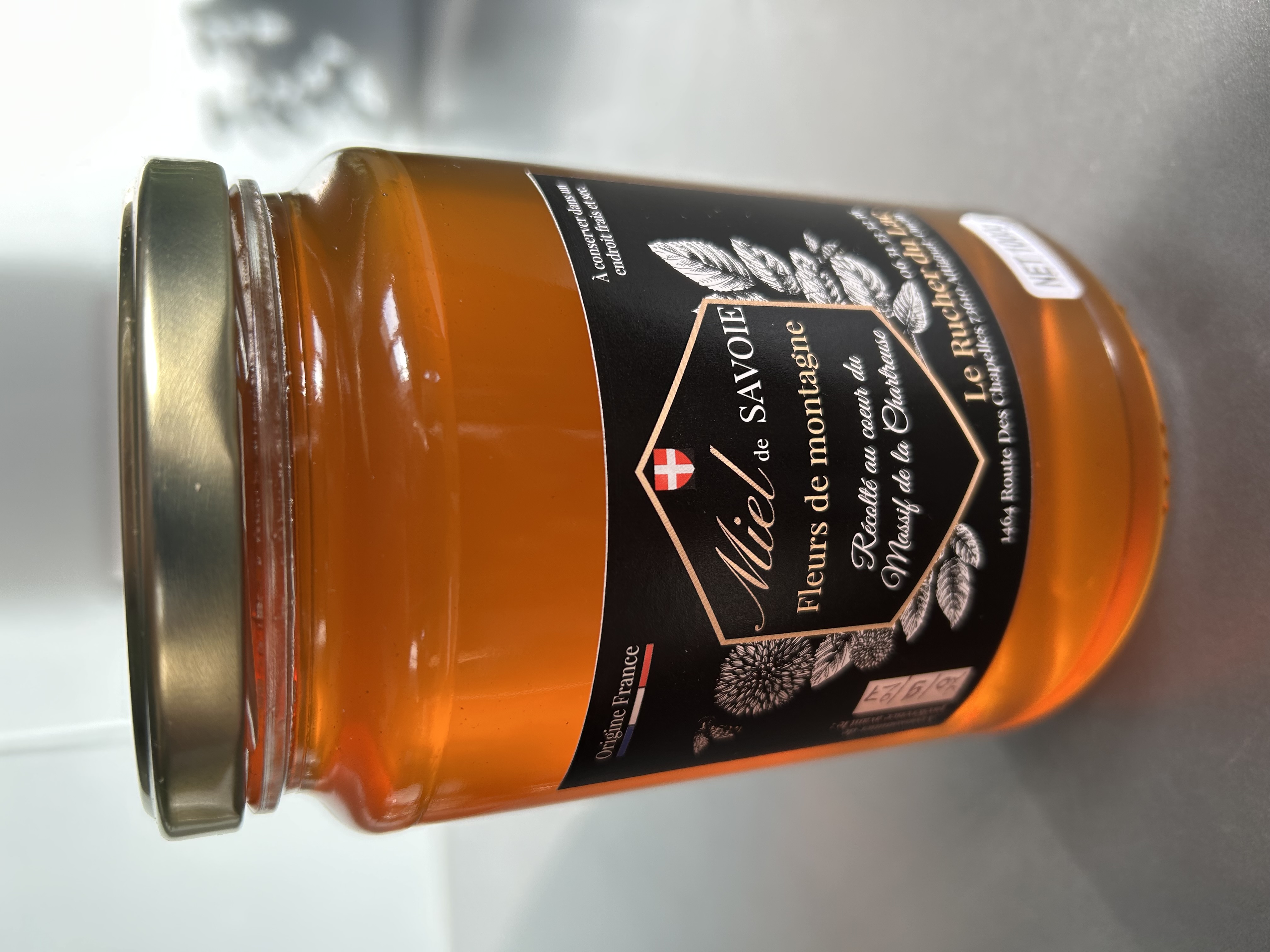 Miel artisanal toutes fleurs en pot en verre de 1 kg 