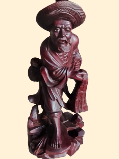 Figura tallada en madera de viajero oriental