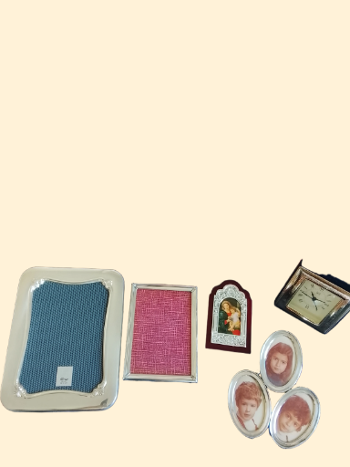 Portarretrato de plata y otros