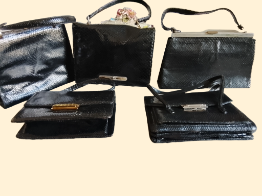 Bolsos de cuero negro con piel de serpiente