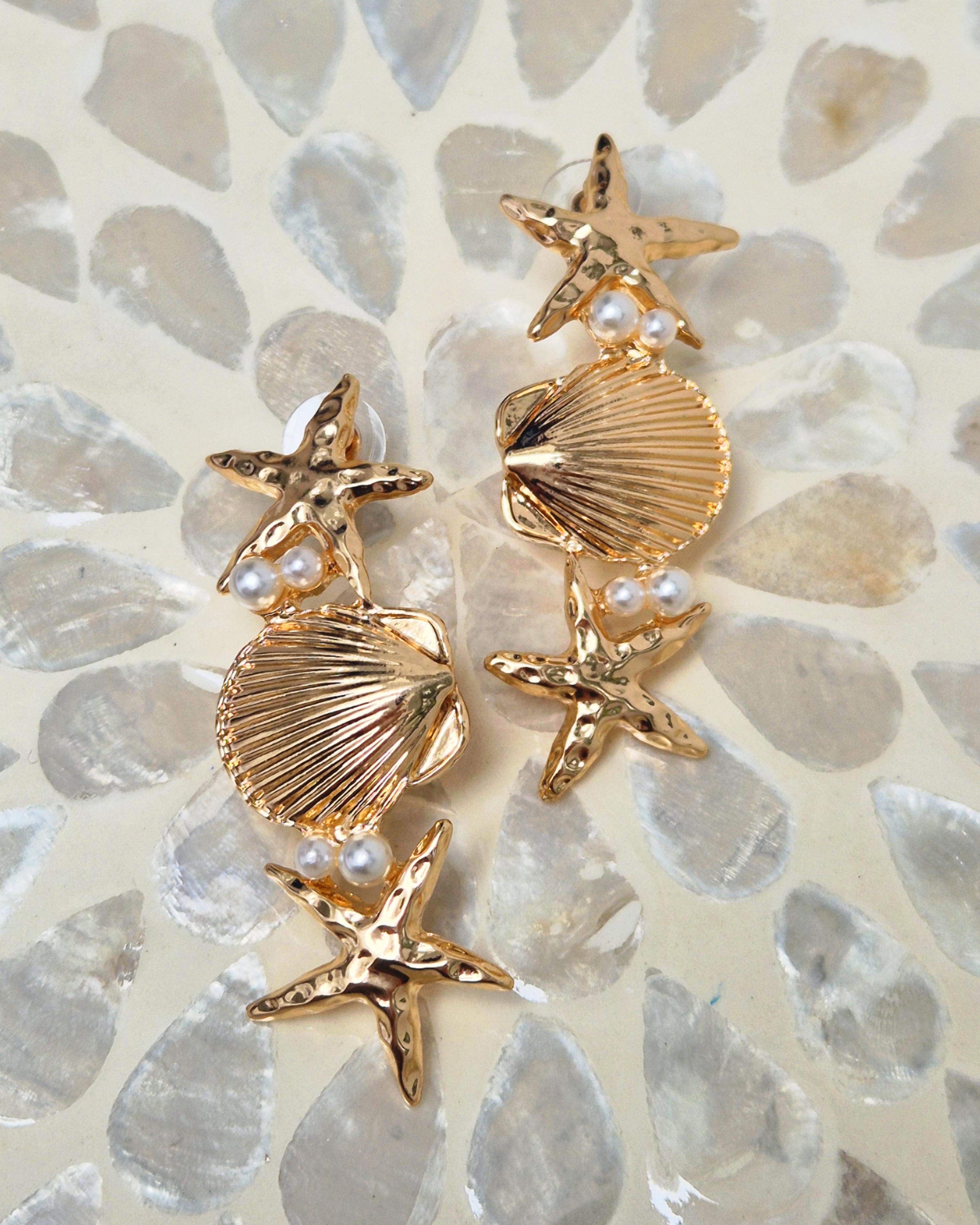 Brinco Concha e estrela