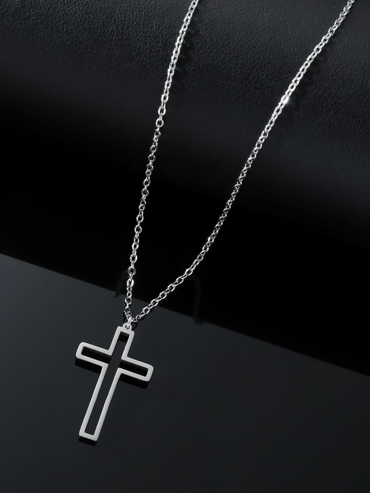 Collar de cruz plateada