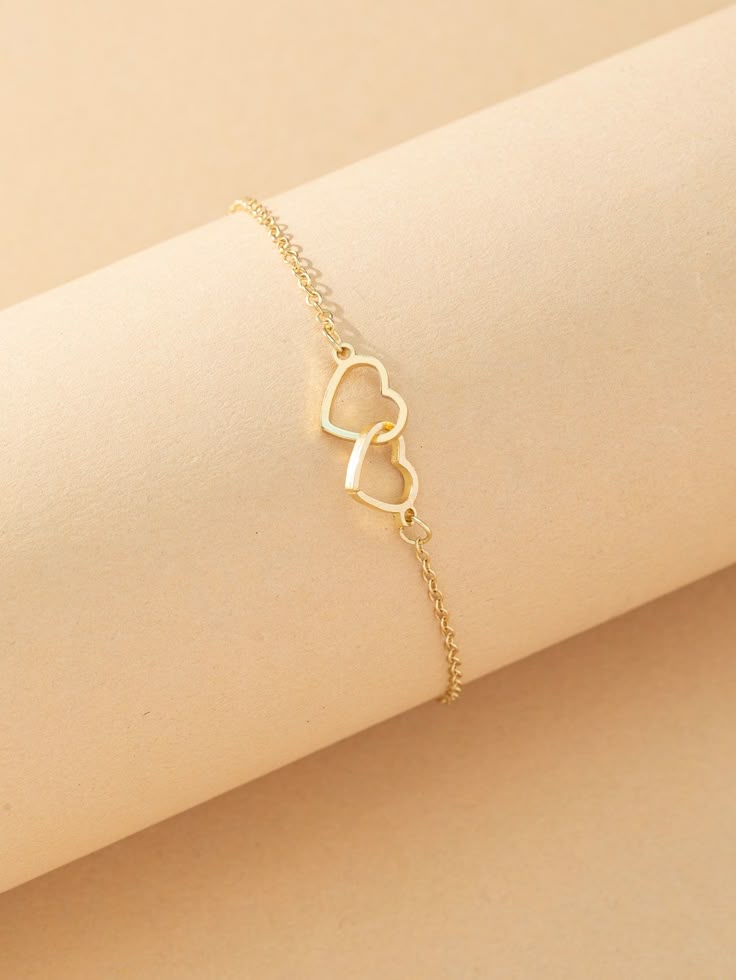 Pulsera de corazones oro