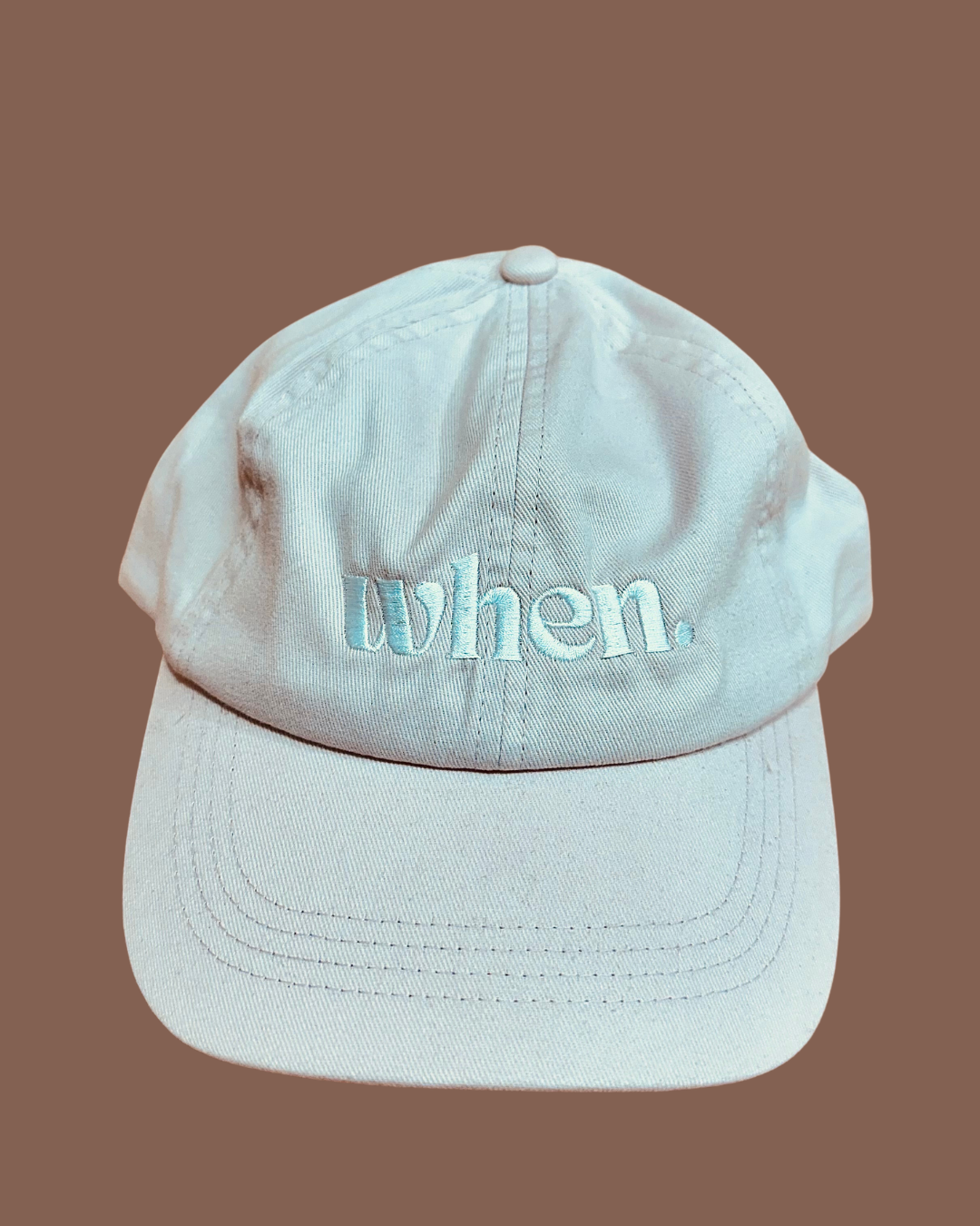 The PINK when.agency logo cap