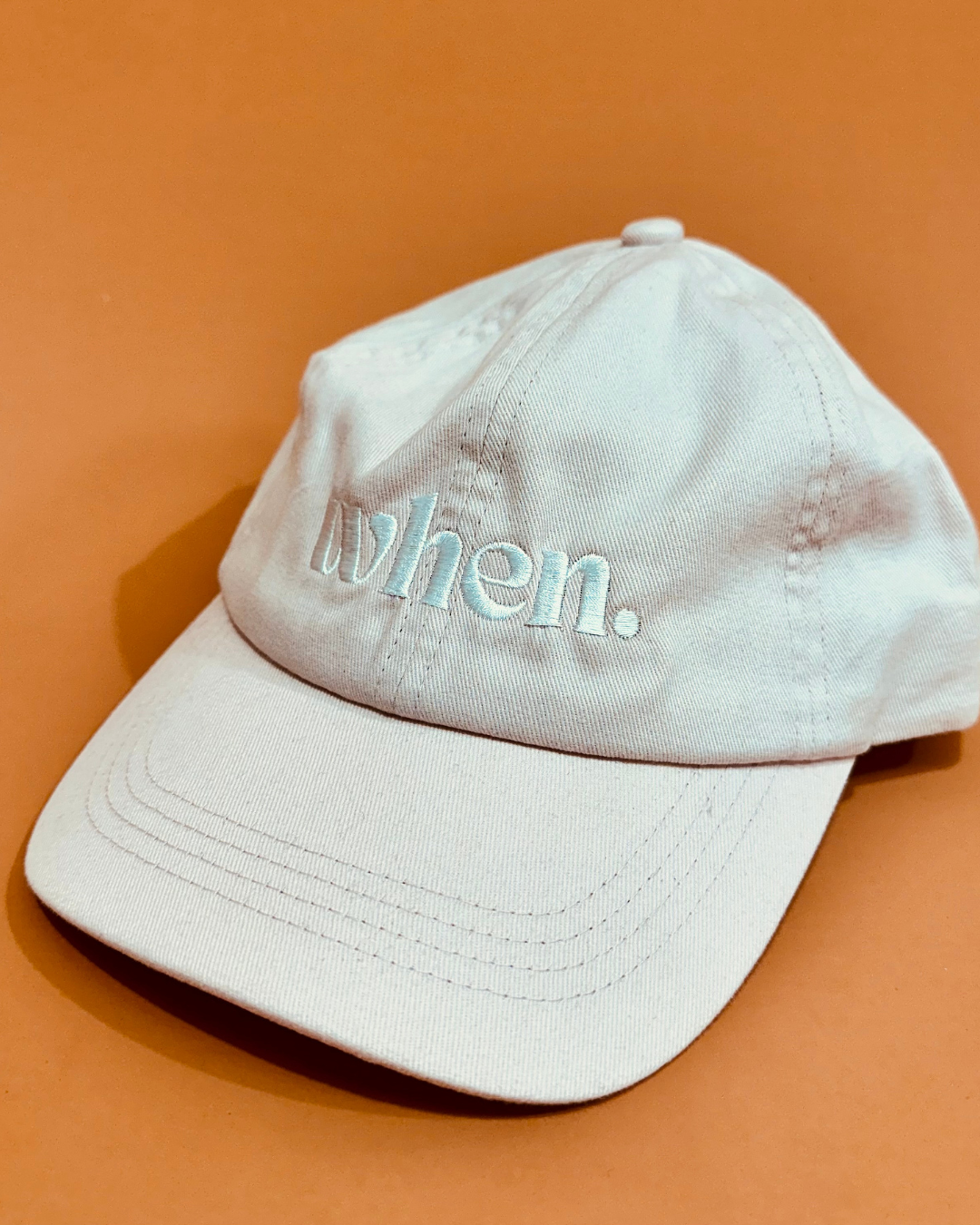 The PINK when.agency logo cap
