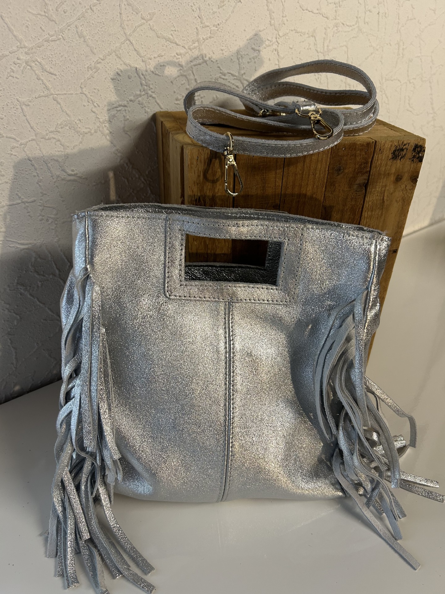 Sac à main argenté à franges