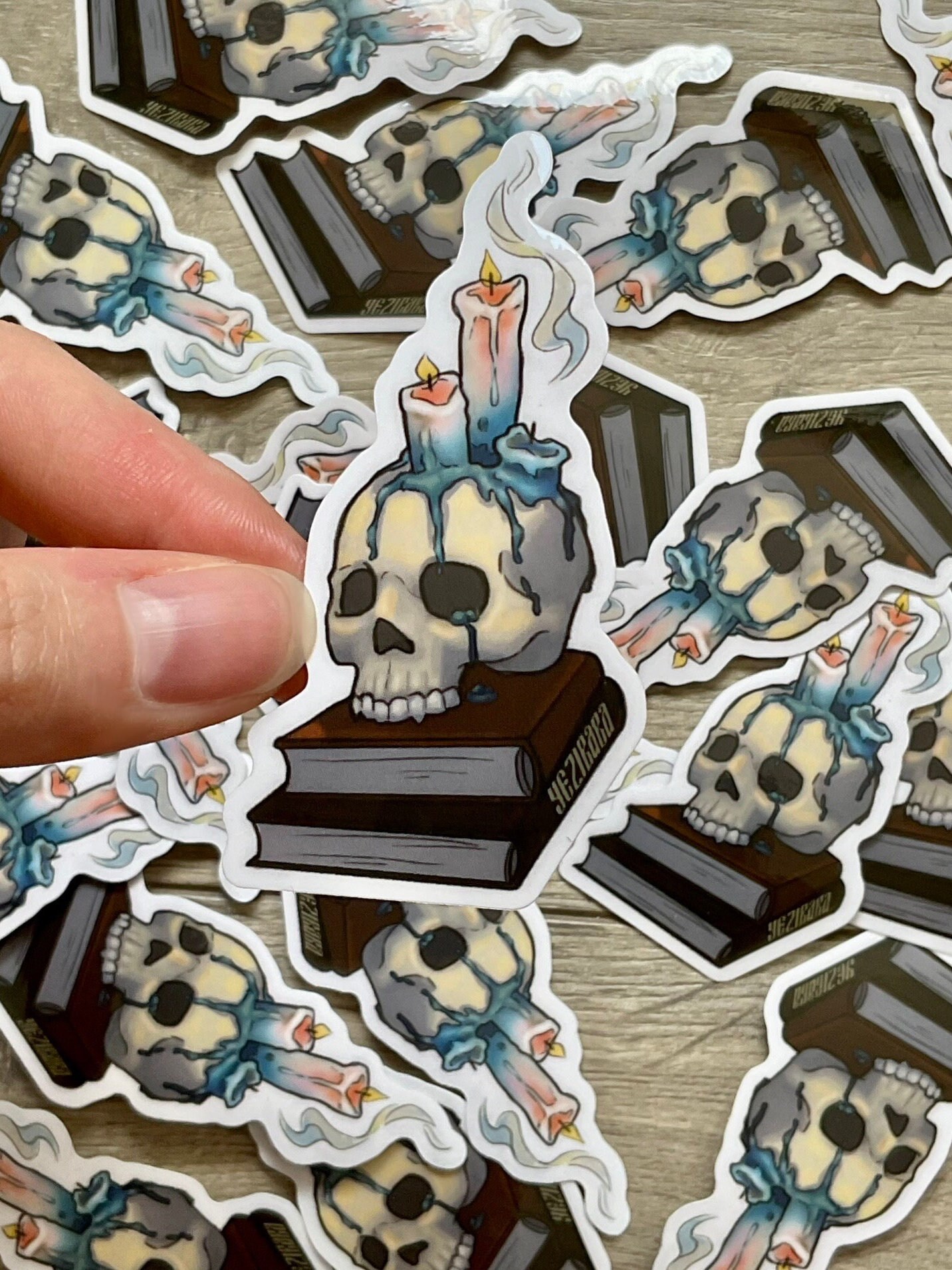 Skull on books Sticker