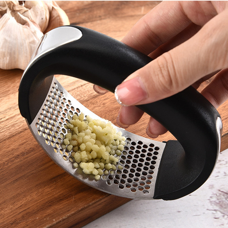 Prensa  trituradora de ajo ergonómica