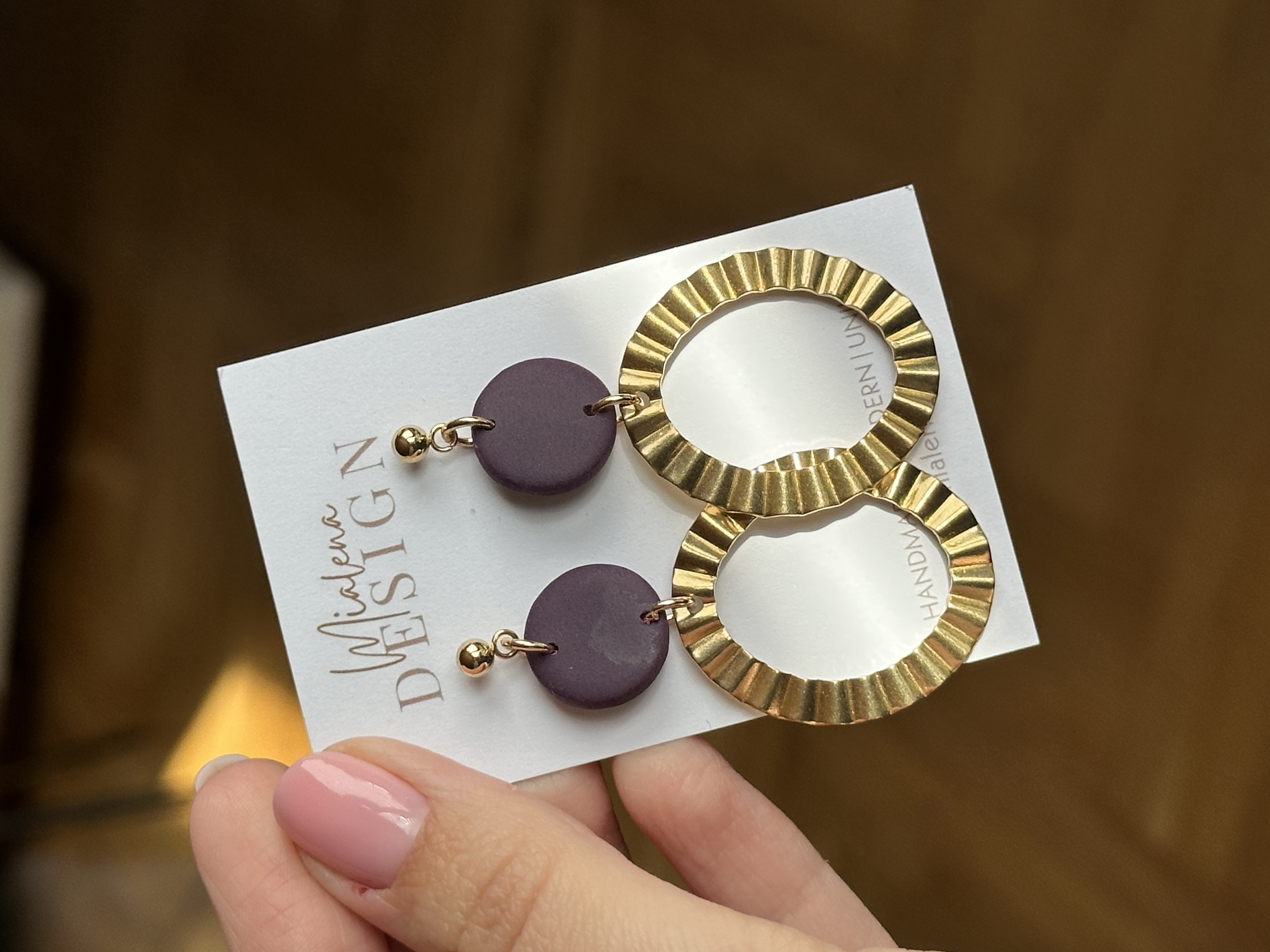 Goldene Statement-Ohrringe