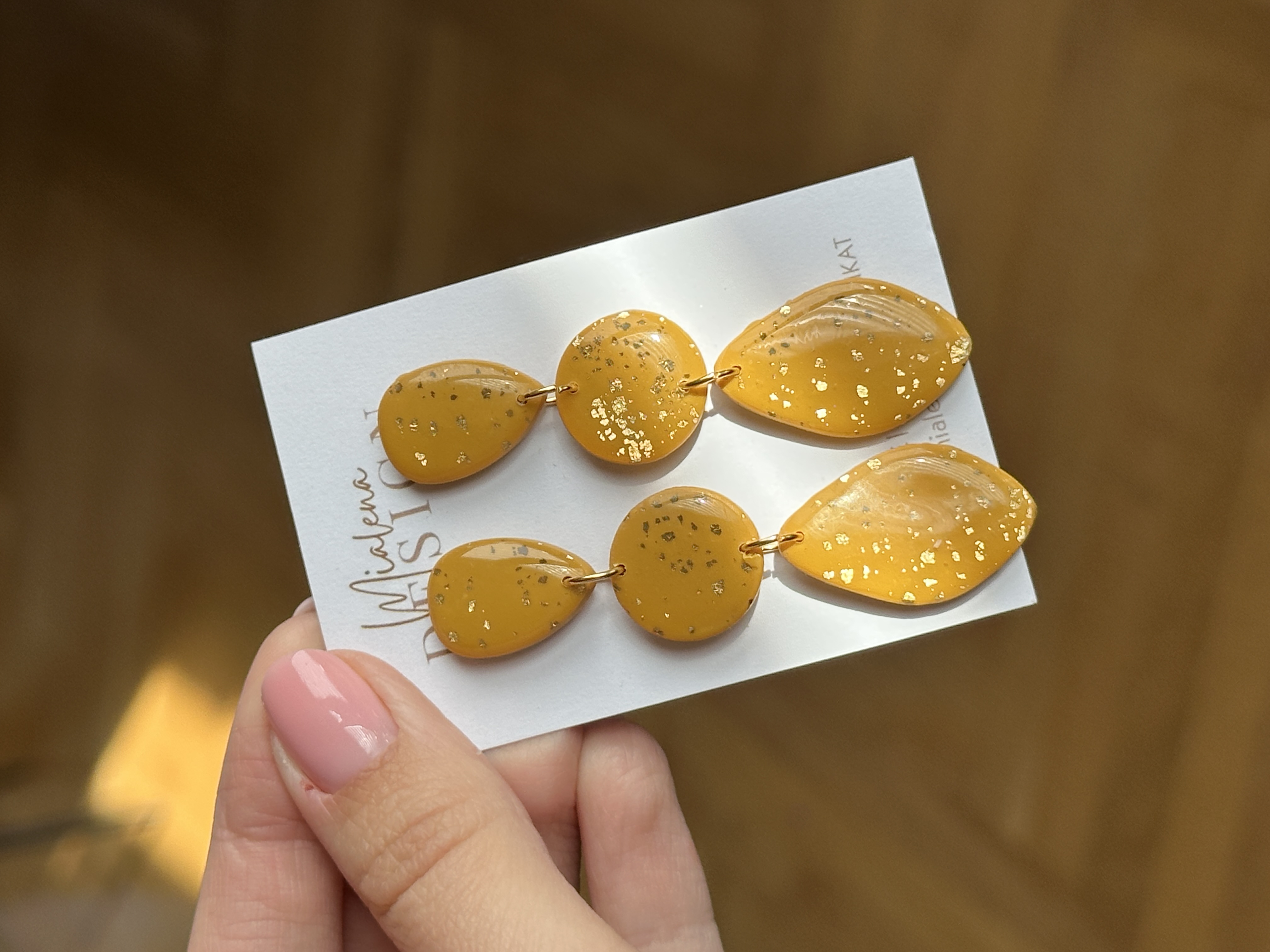 Goldene Statement-Ohrringe