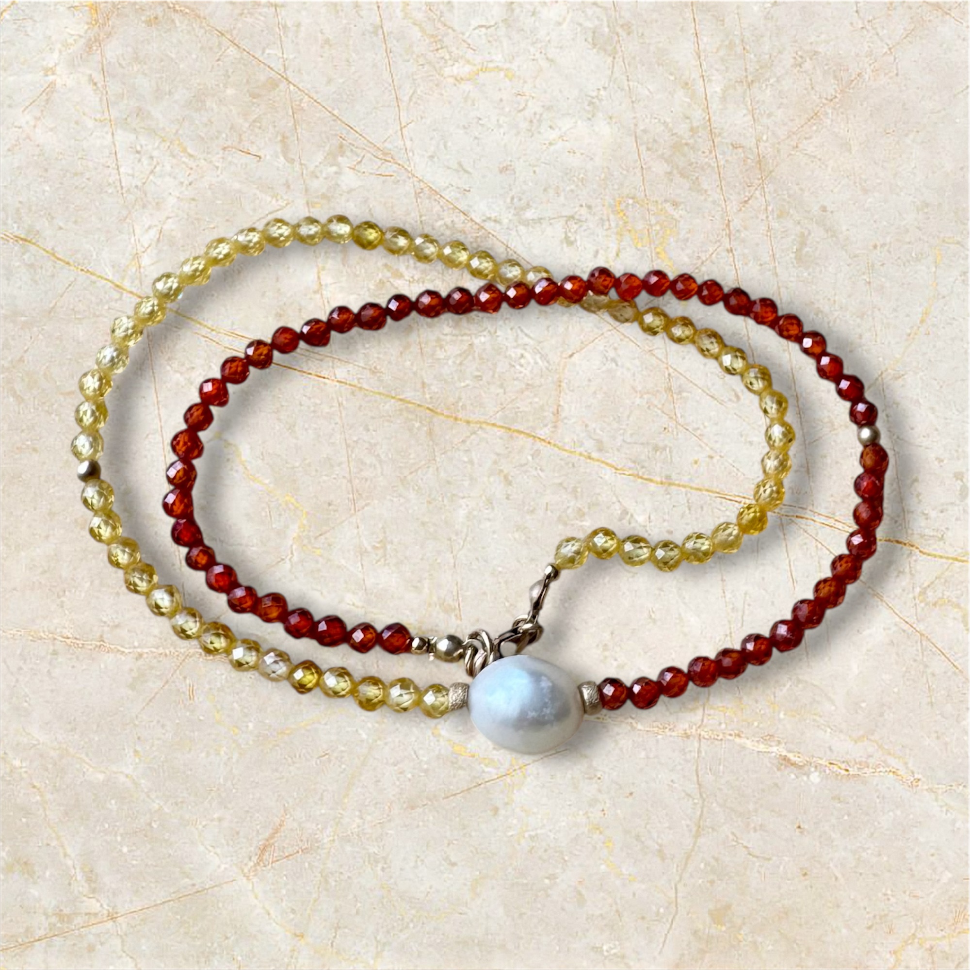 Crystal beaded necklace with freshwater pearl.