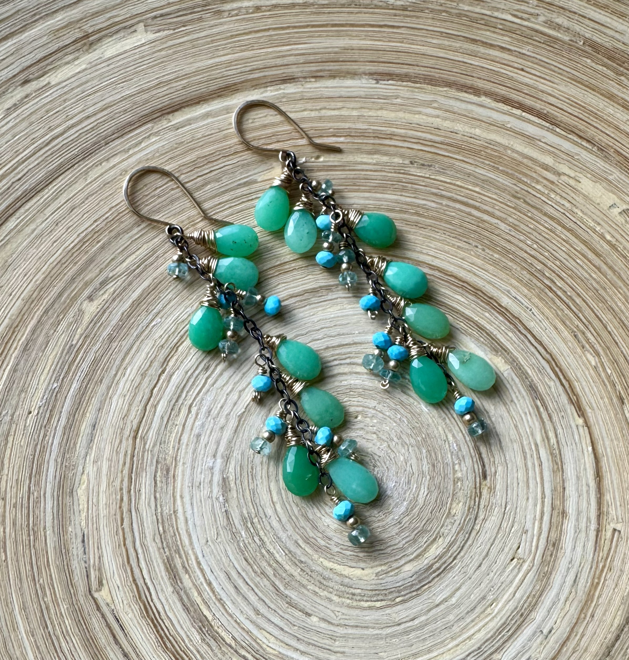 Long mixed metal earrings with Chrysoprase and Apatite gemstones