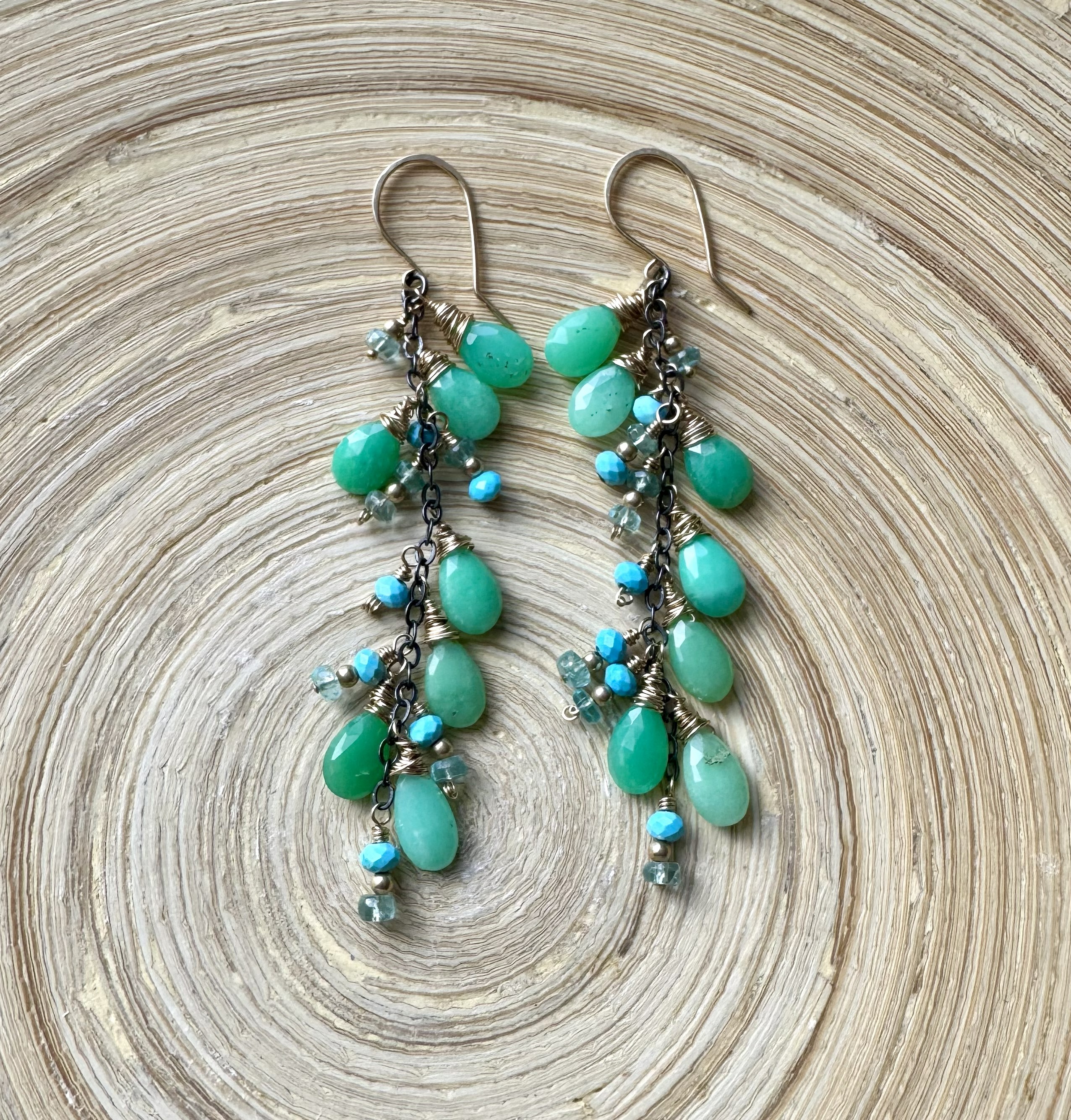 Long mixed metal earrings with Chrysoprase and Apatite gemstones