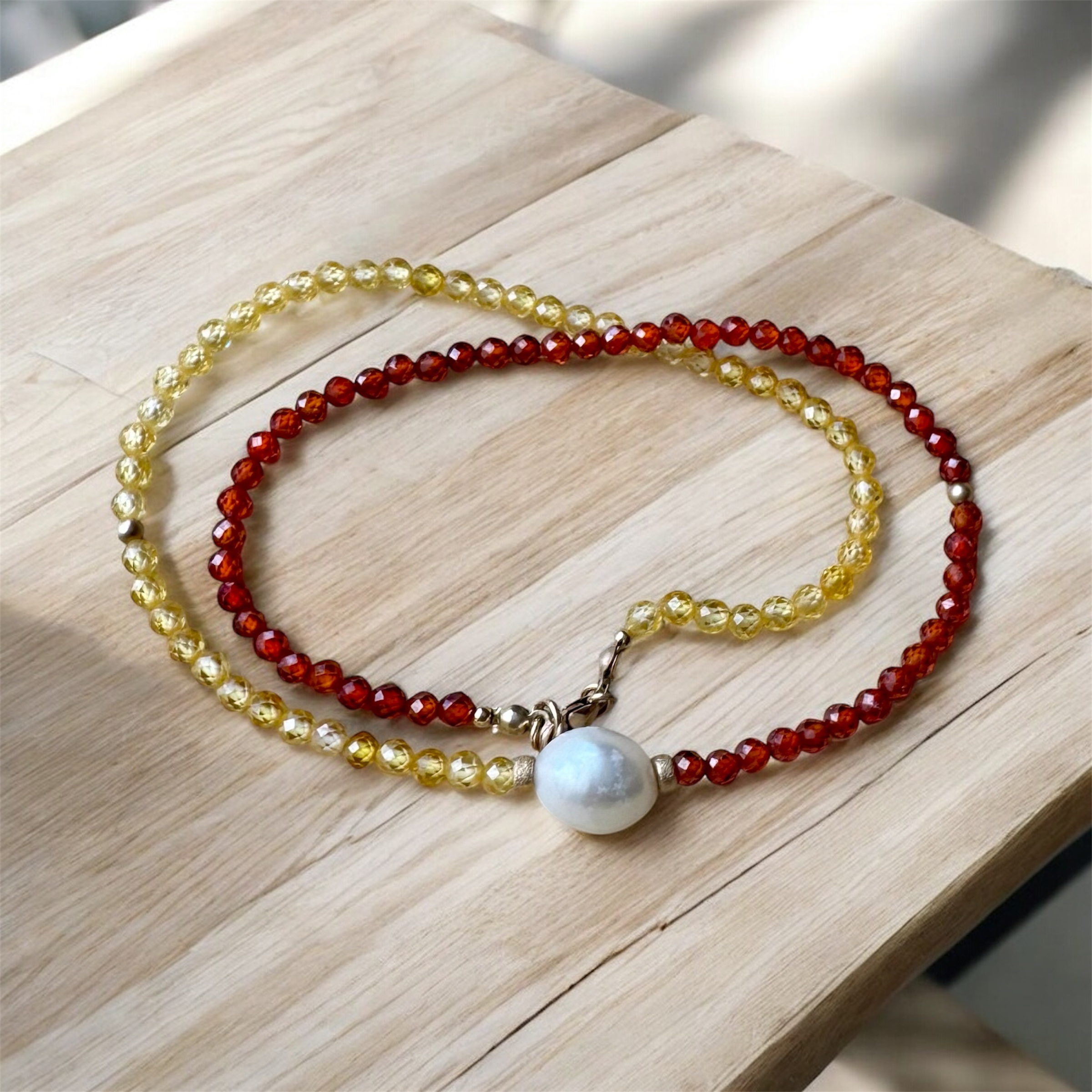 Crystal beaded necklace with freshwater pearl.