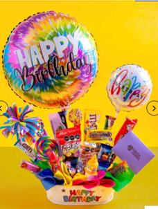 Arreglo de cumpleaños con globos y dulces