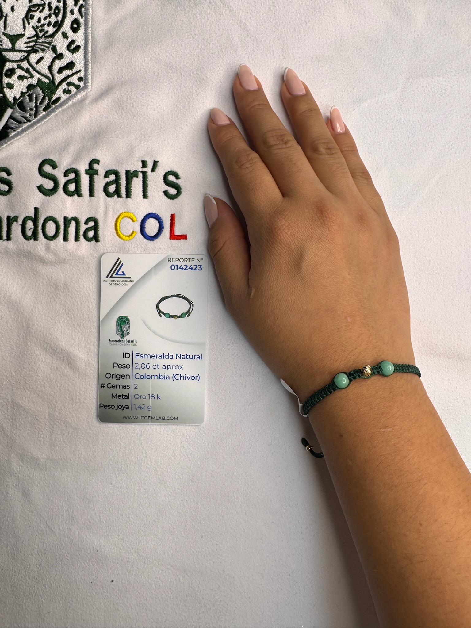 Pulsera tejida con esmeraldas y oro 18.6K