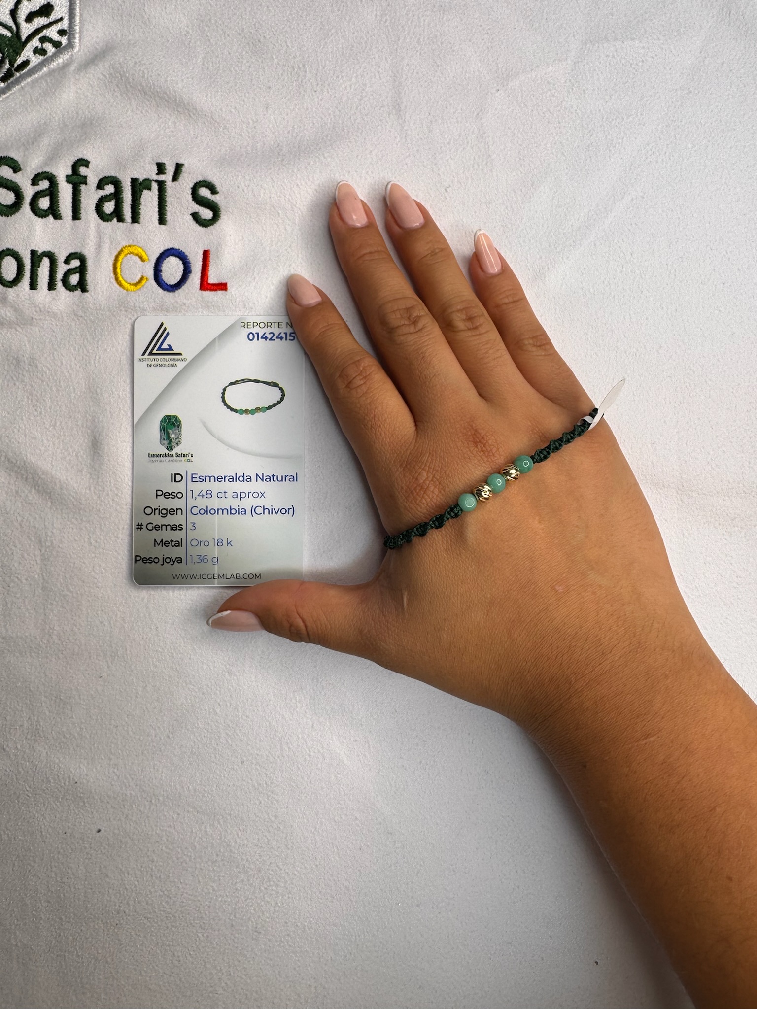 Pulsera tejida con esmeraldas y oro 18.6K