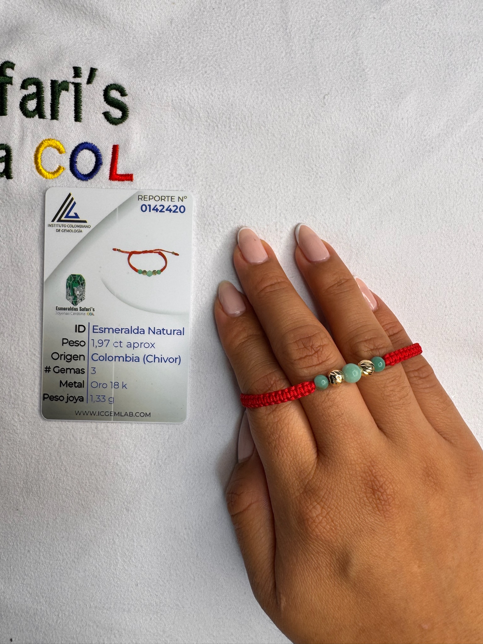 Pulsera tejida con esmeraldas y oro 18.6K