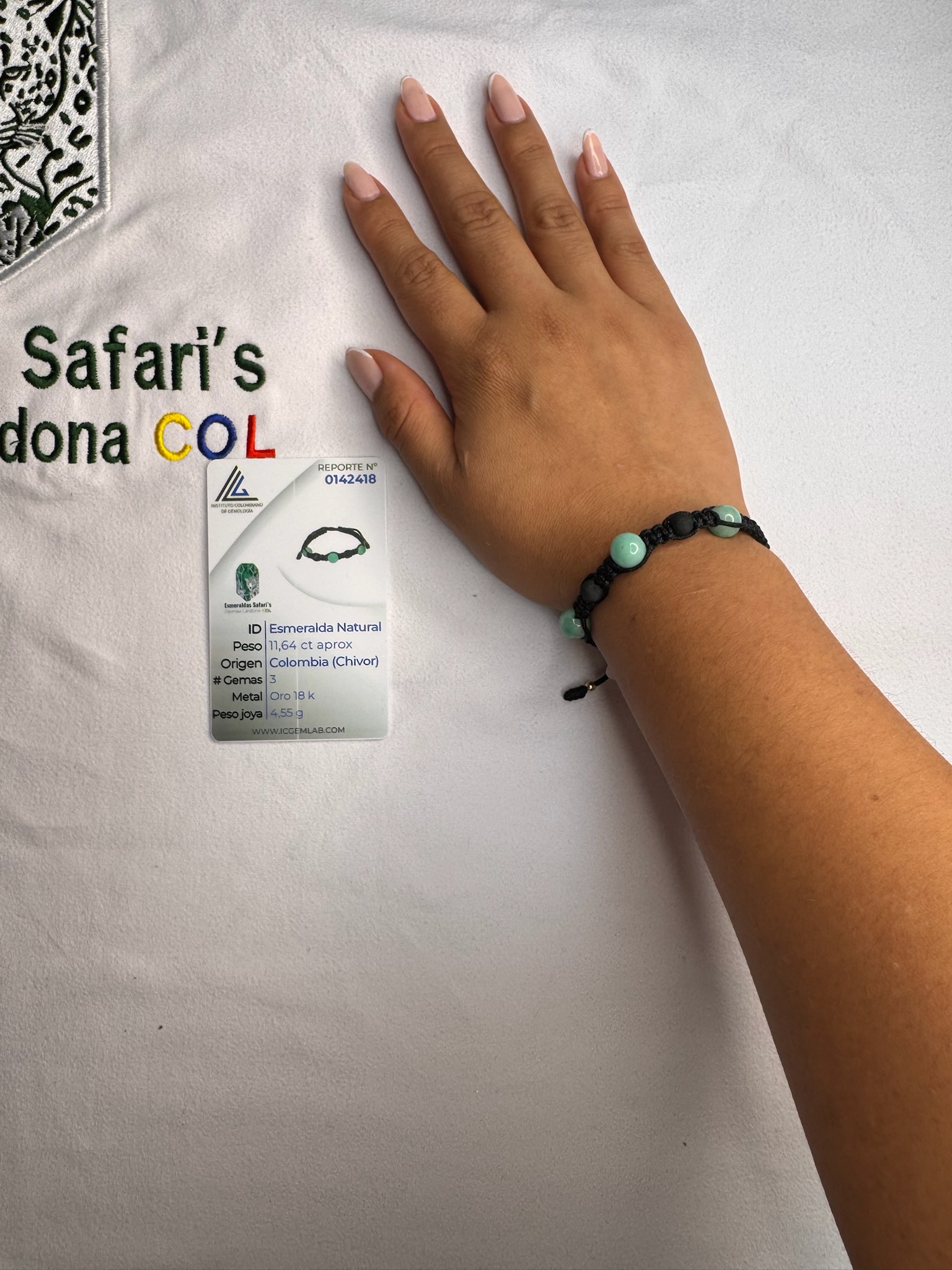 Pulsera tejida con esmeraldas y oro 18.6K