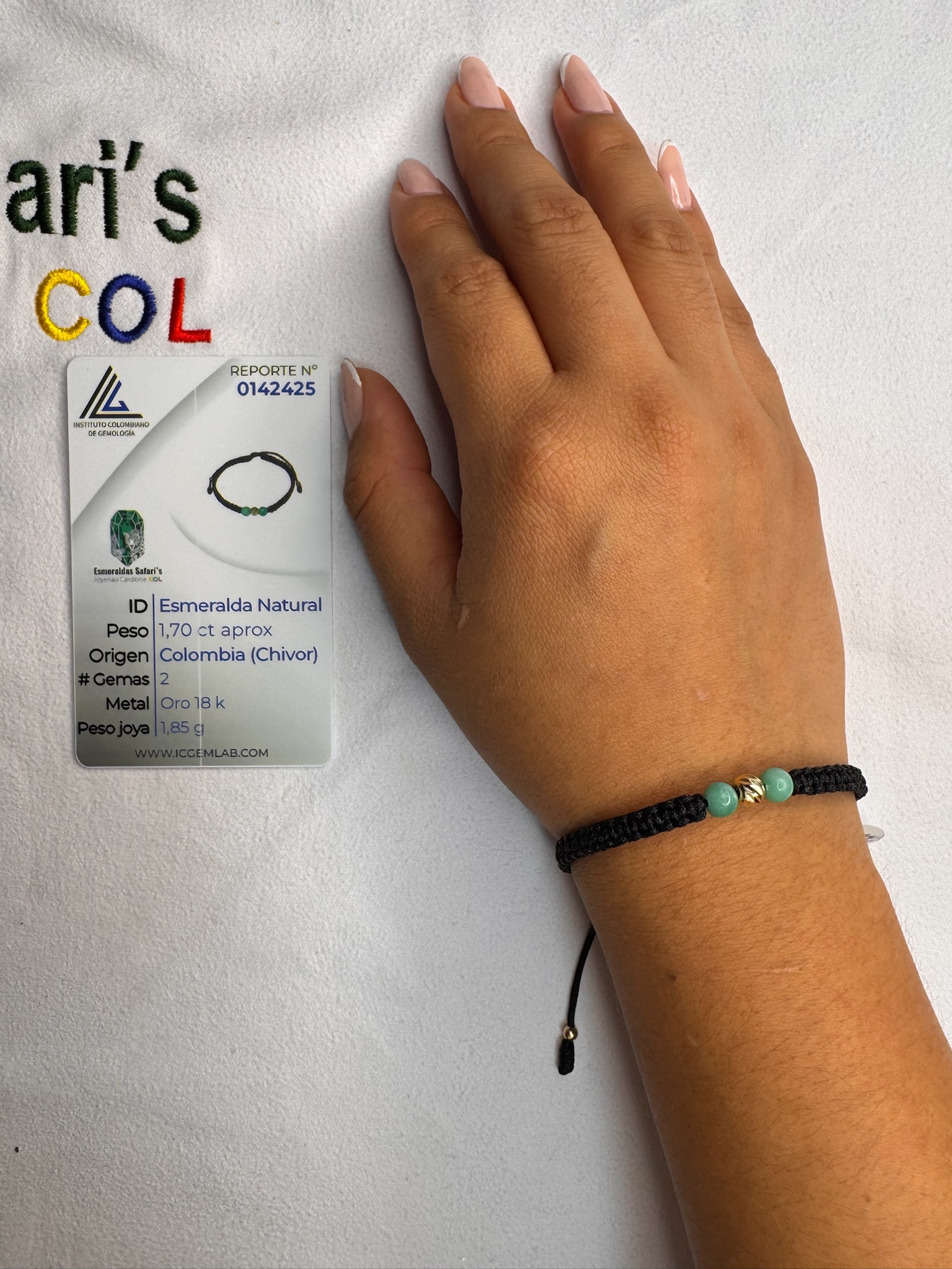 Pulsera tejida con esmeraldas y oro 18.6k