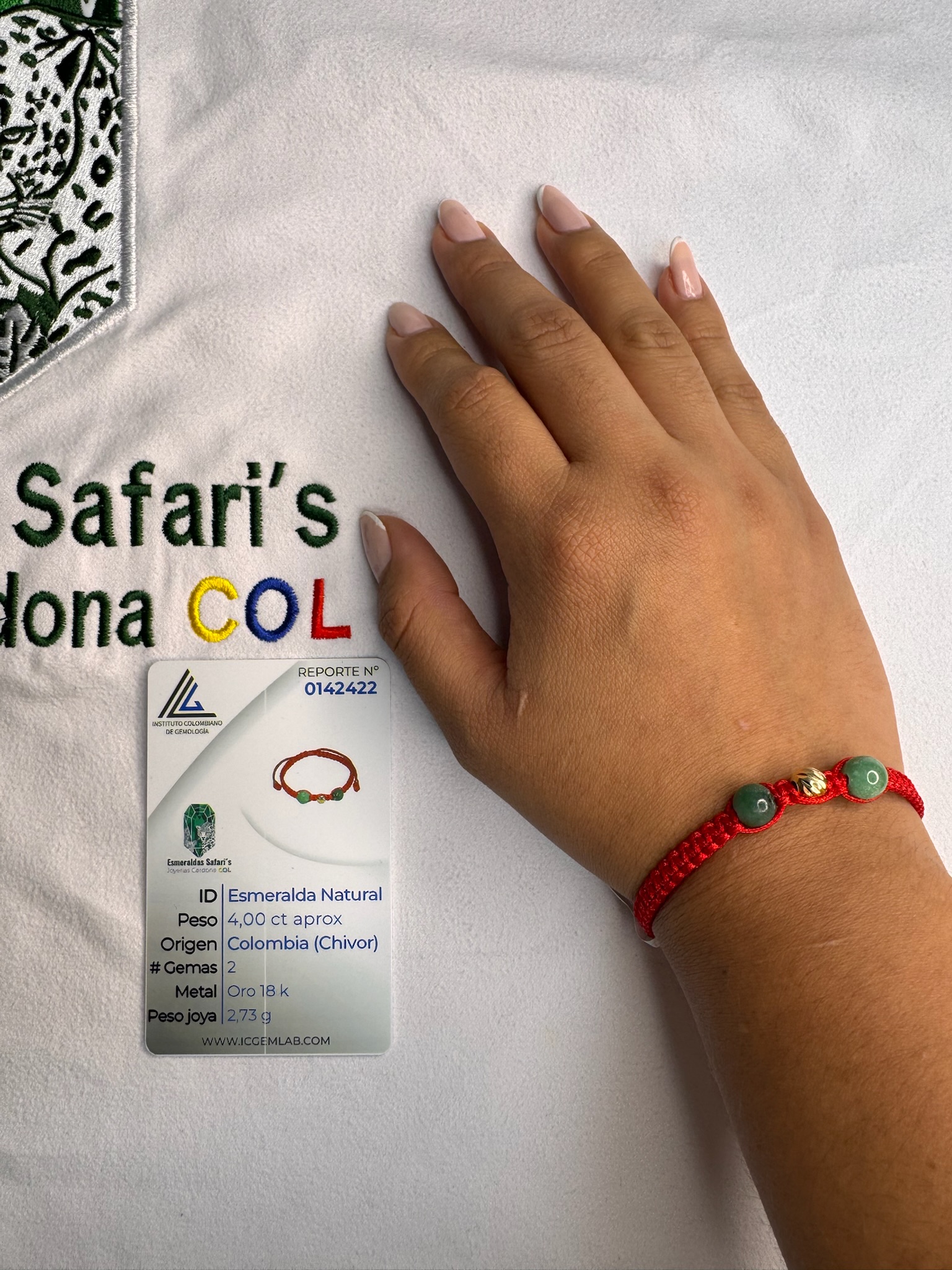 Pulsera tejida con esmeraldas y oro 18.6K