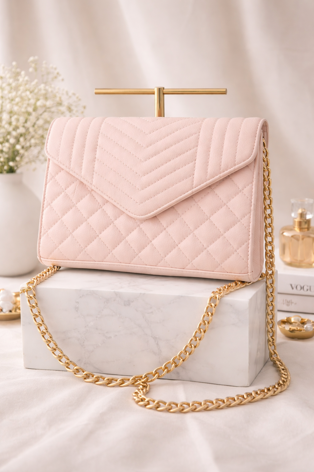 Sac à main matelassé rose poudré