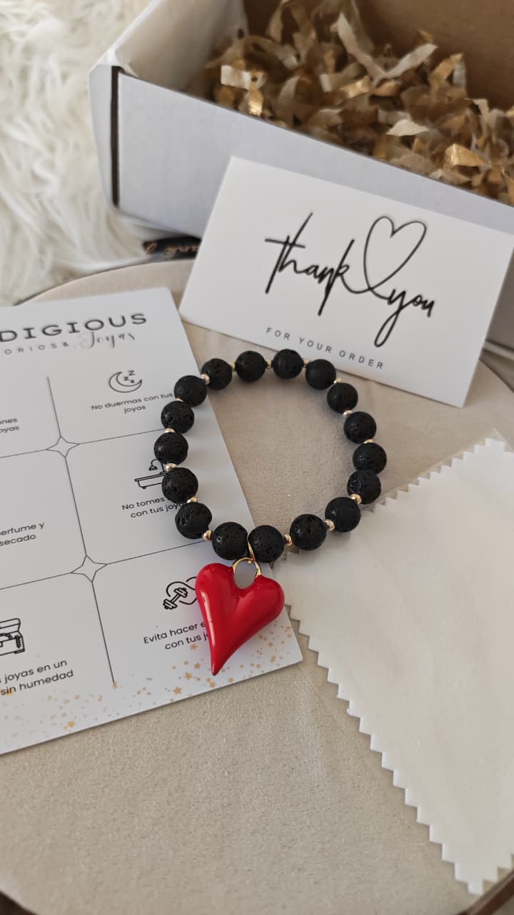 Pulsera Piedra Volcanica + Dije Rojo