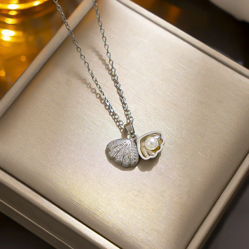 Collier coquillage argenté avec perle