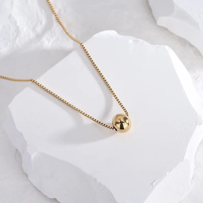 Collier boule en plaquage or