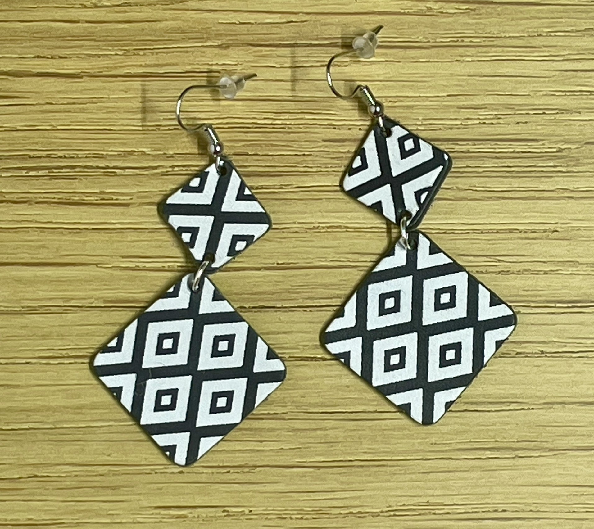 Black and white diamond patterned earrings