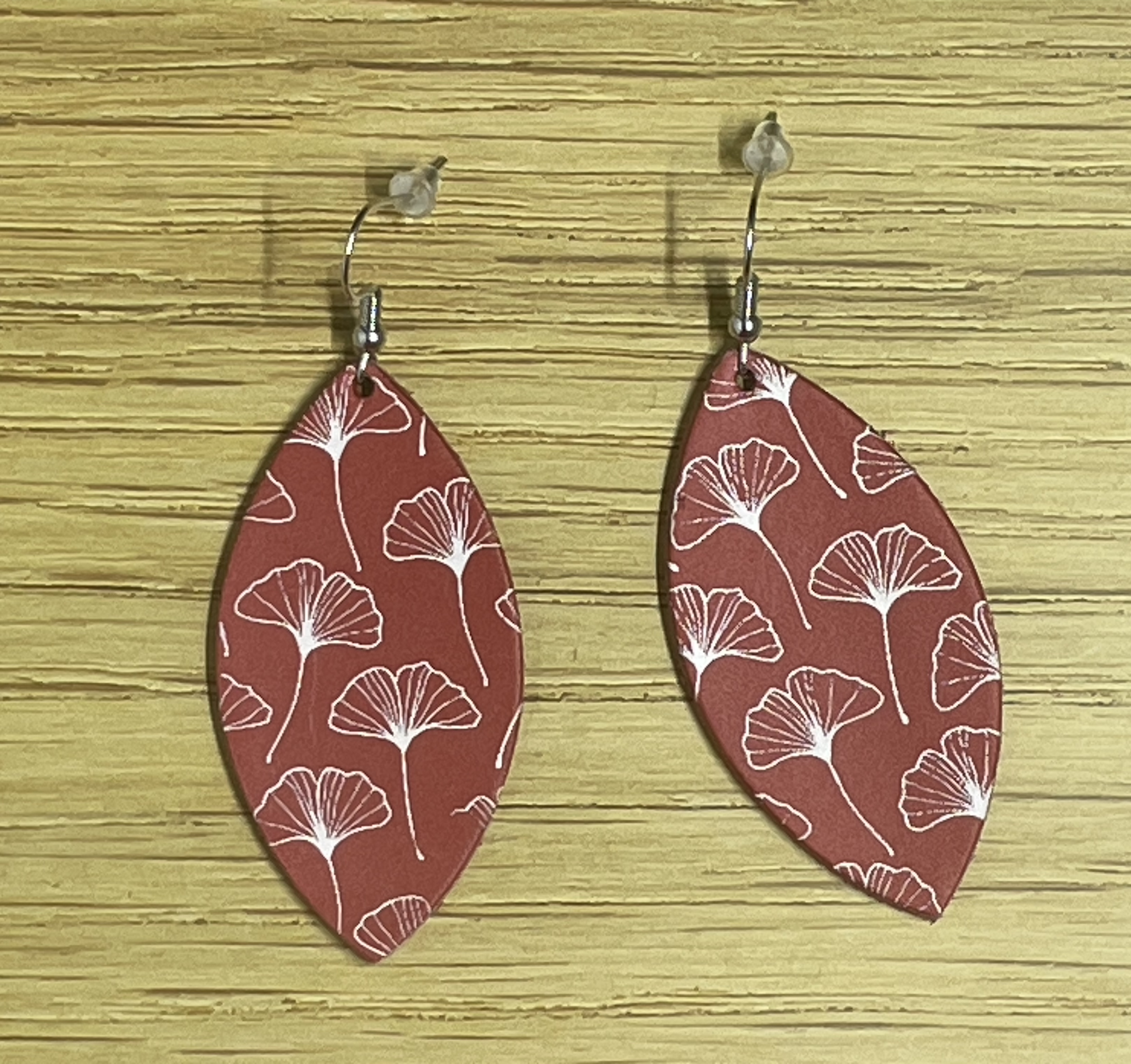 Red whispy flower leather earrings