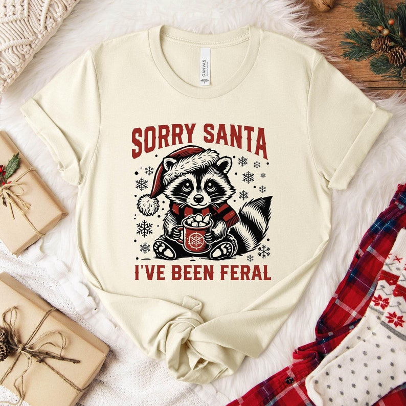 Funny Christmas Raccoon T-Shirt: Sorry Santa, Feral Holiday Tee