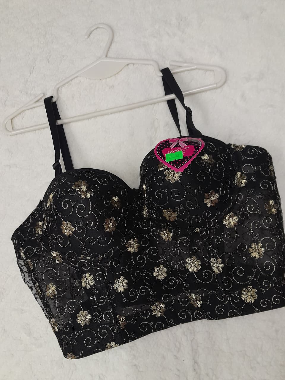 Top bustier negro con flores doradas