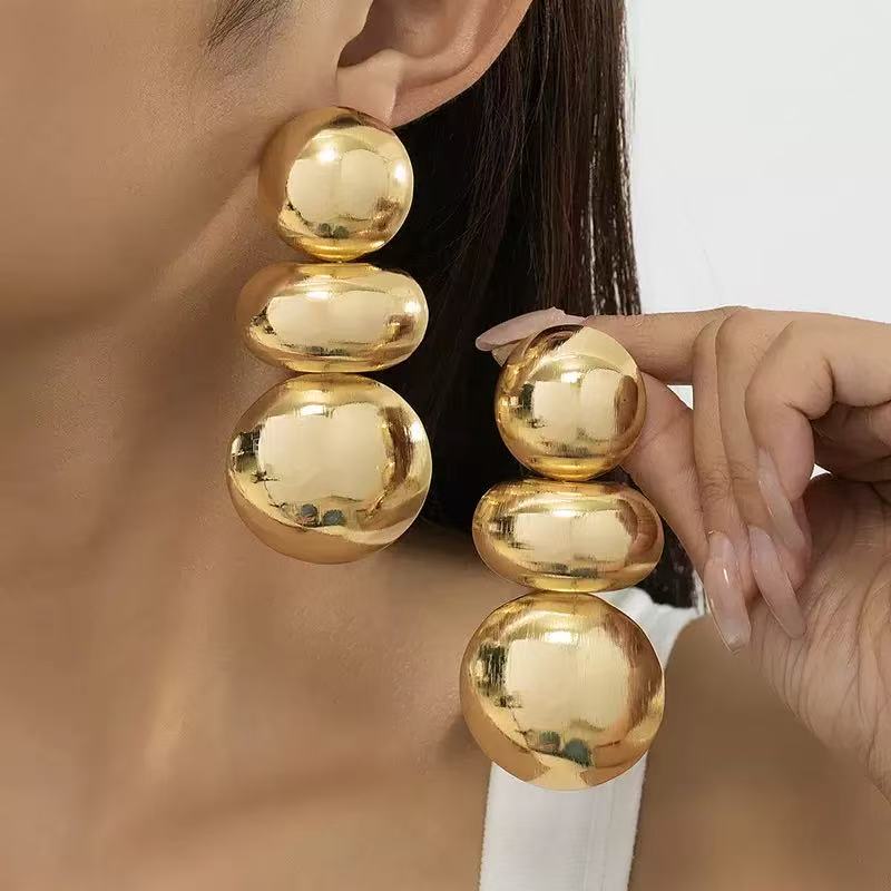 Bold gold statement earrings