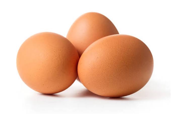 Fresh Brown Egg with orange yolk