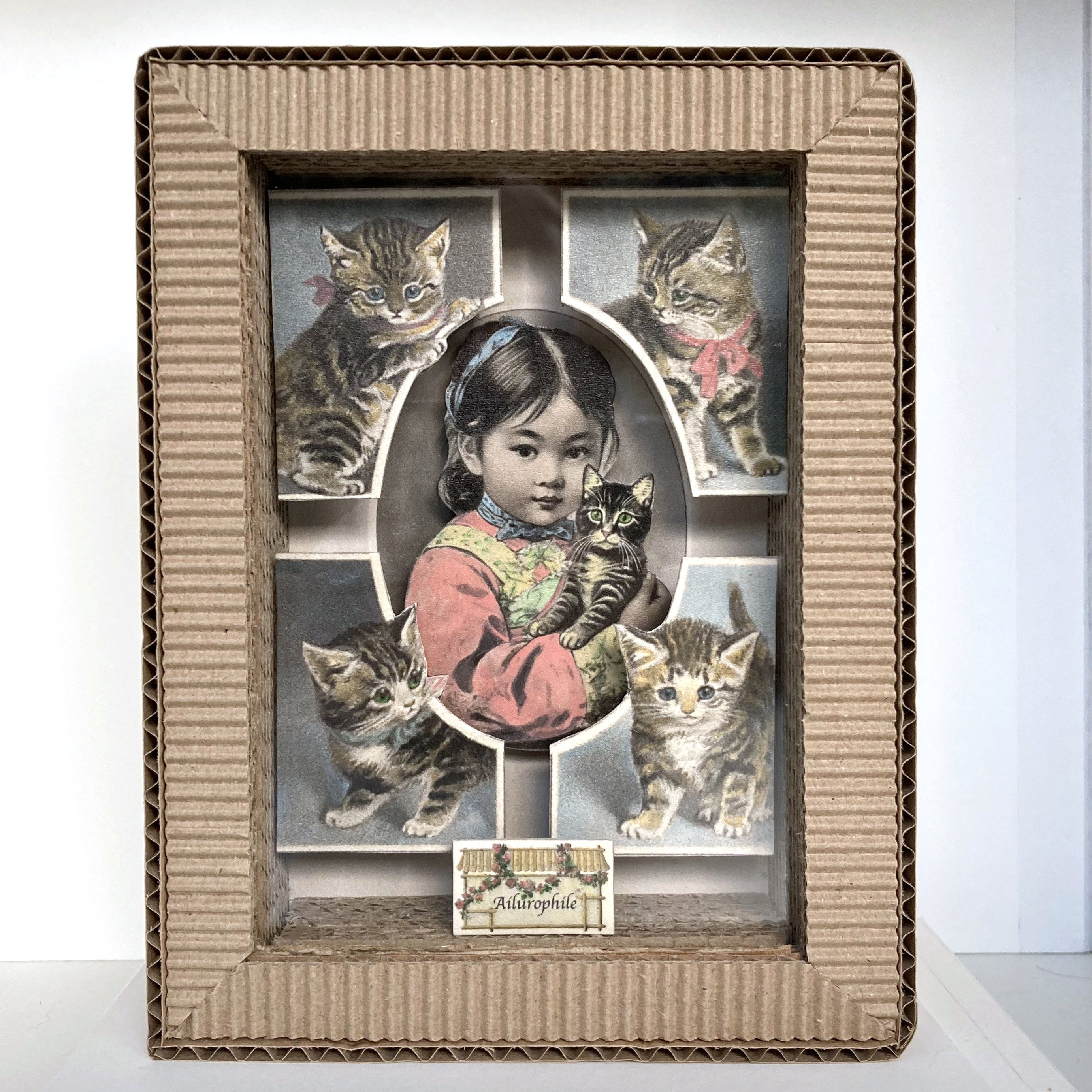 Petite vitrine Fillette aux chats #1