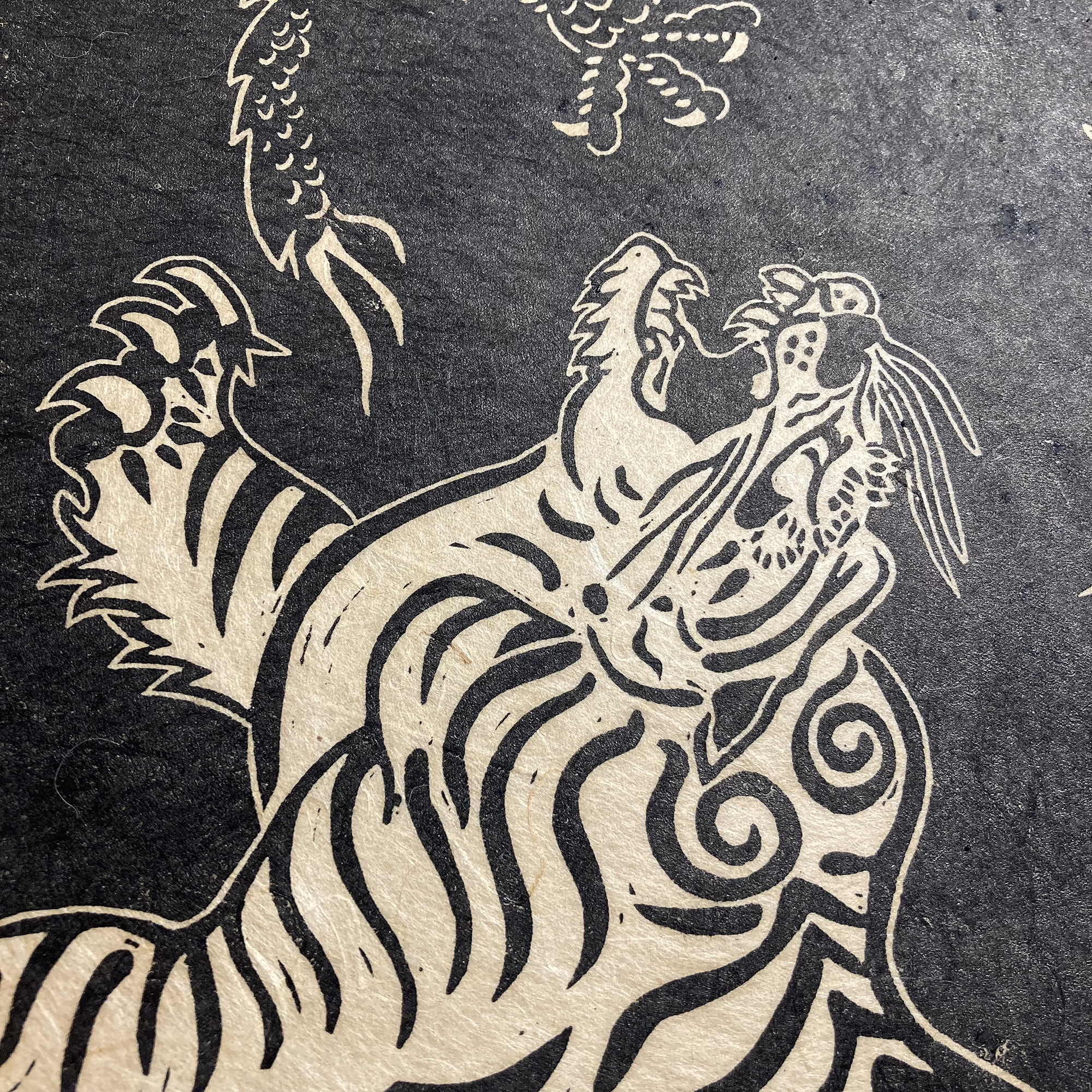 Linogravure « Le combat du tigre et du dragon »