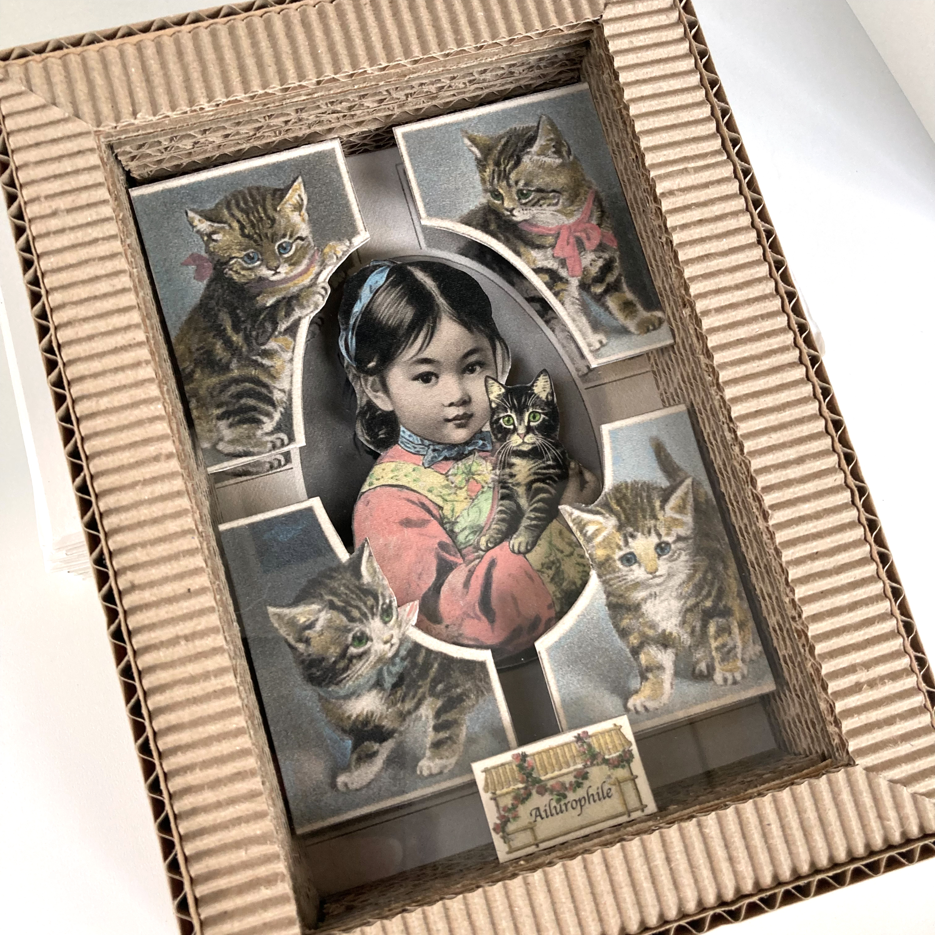 Petite vitrine Fillette aux chats #1