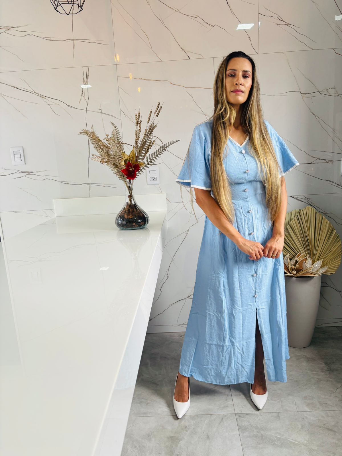 Vestido azul claro com laço 