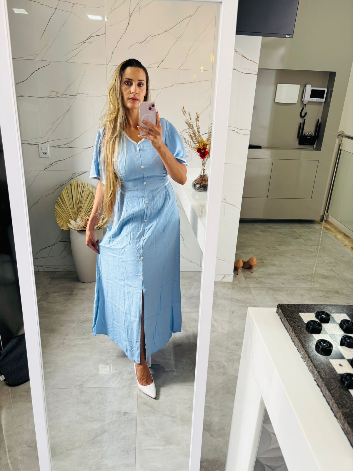 Vestido azul claro com laço 