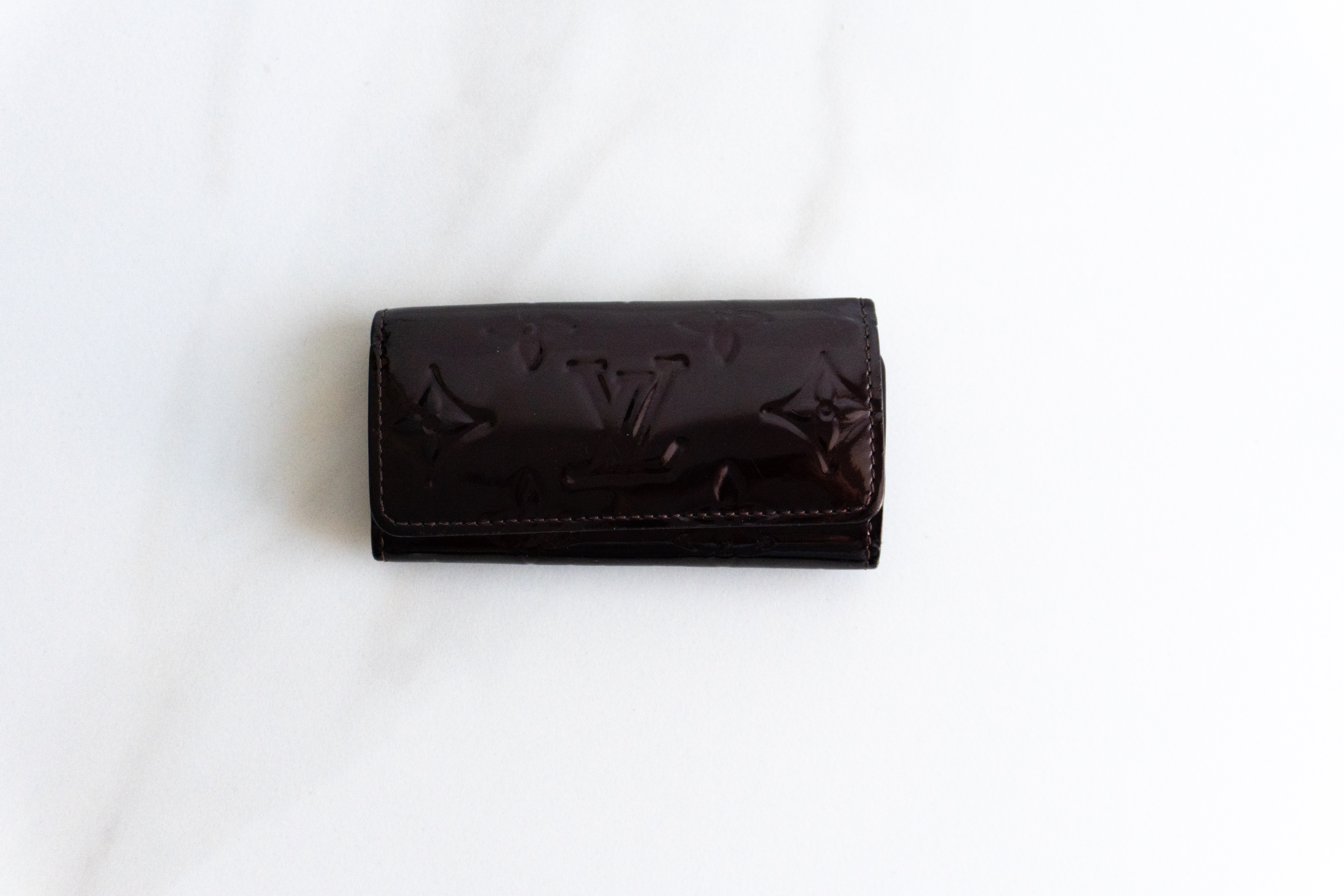 Authentic Louis Vuitton Amarante Monogram Vernis Leather 4 Ring Key Case