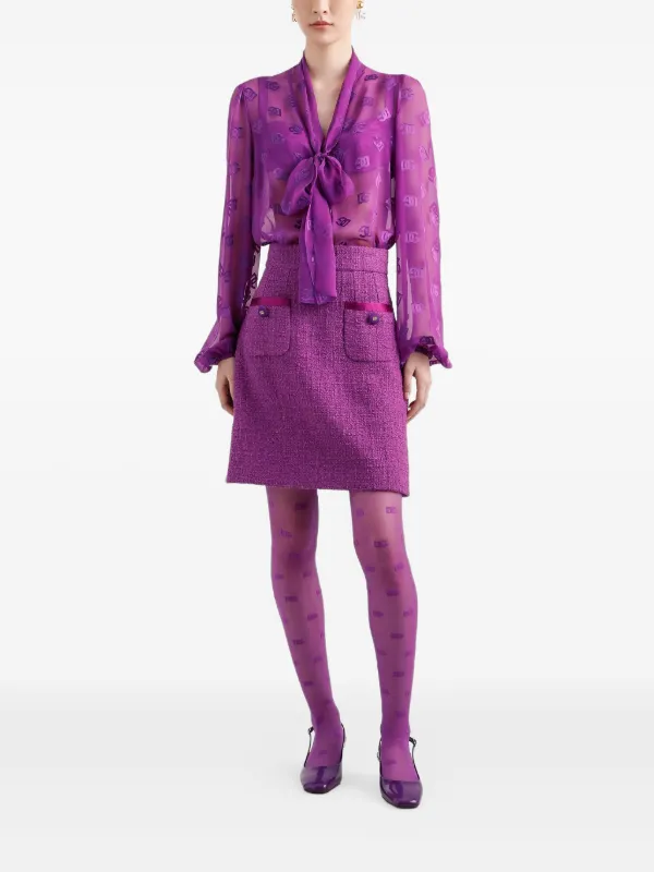 تنورة ميدي من التويد باللون الأرجواني