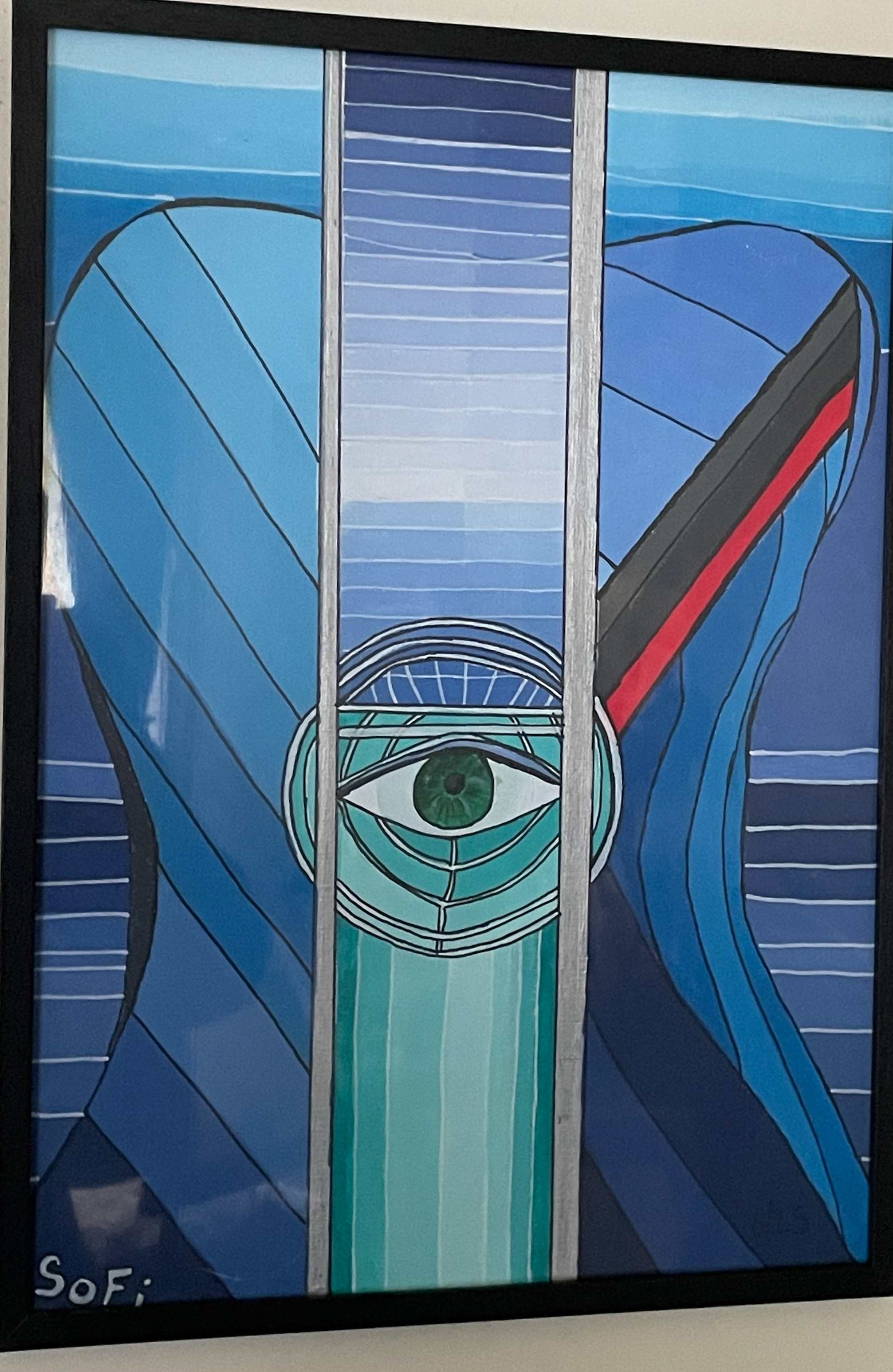 Œil vert sur guitare