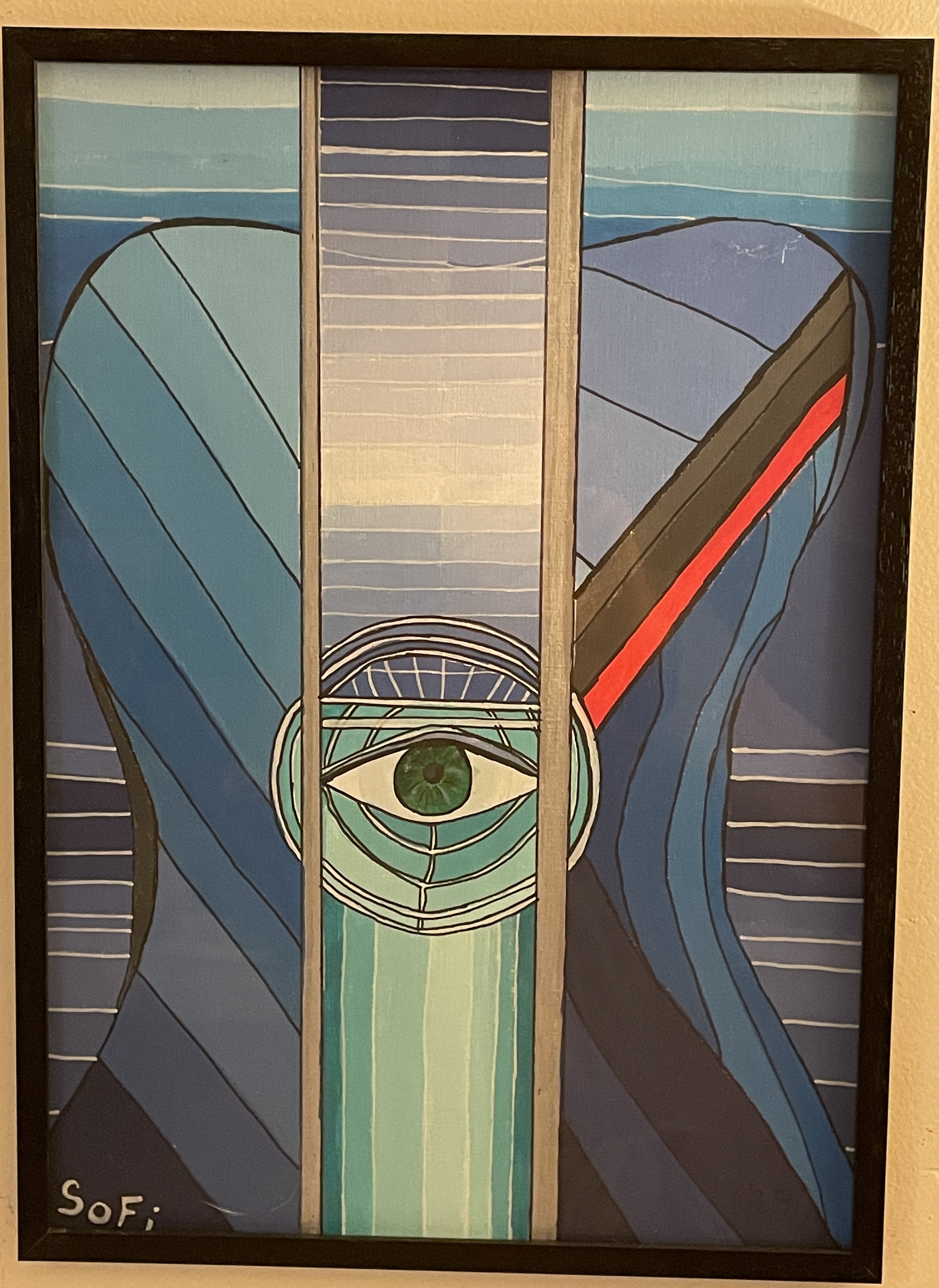 Œil vert sur guitare