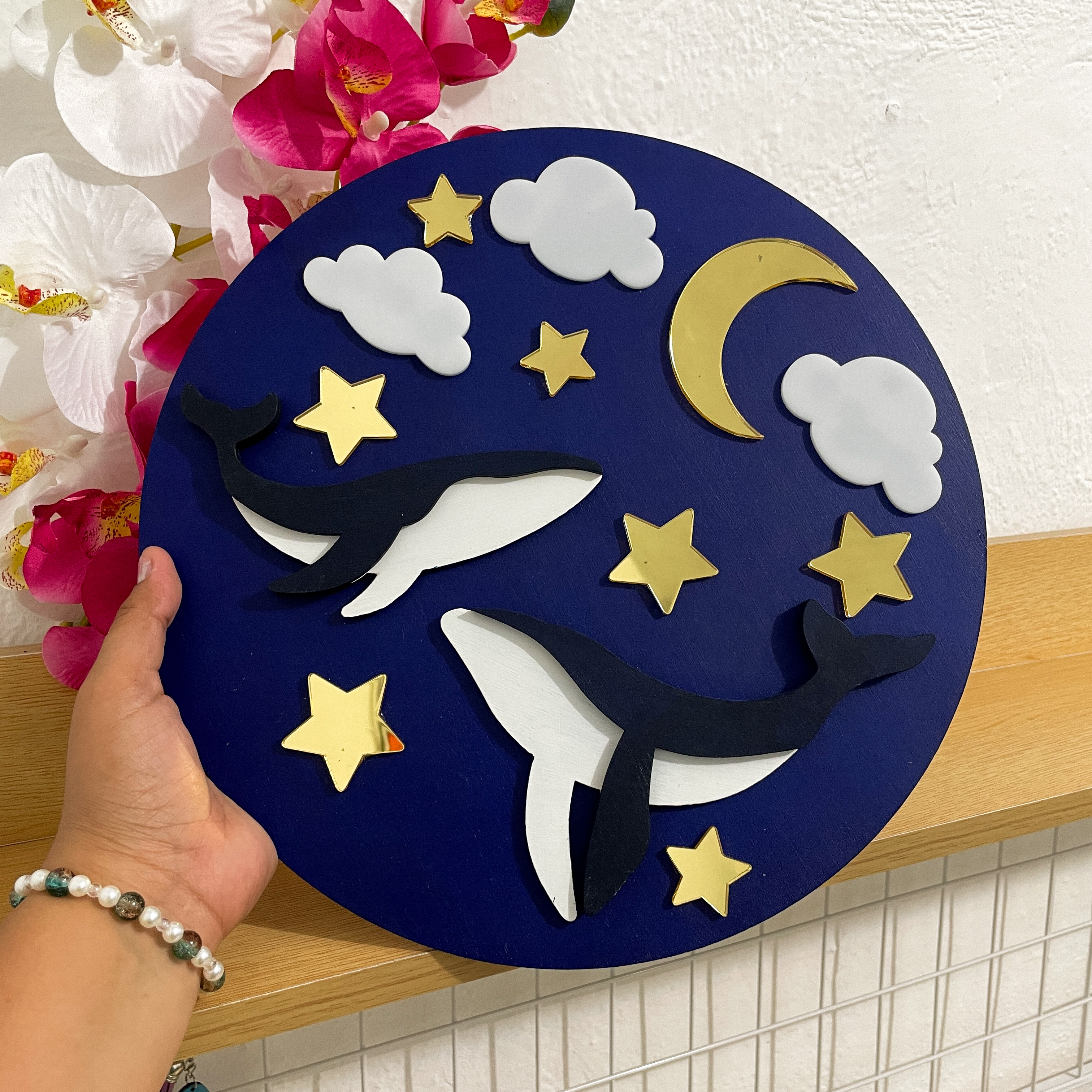 Ballenas bajo la Luna