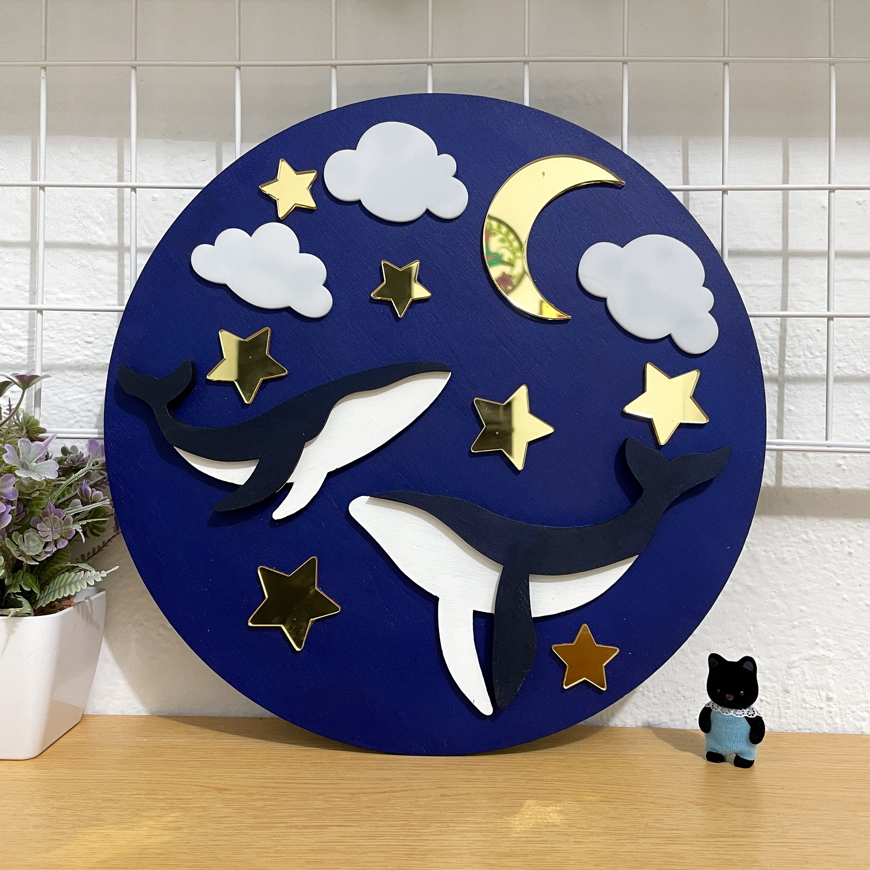 Ballenas bajo la Luna