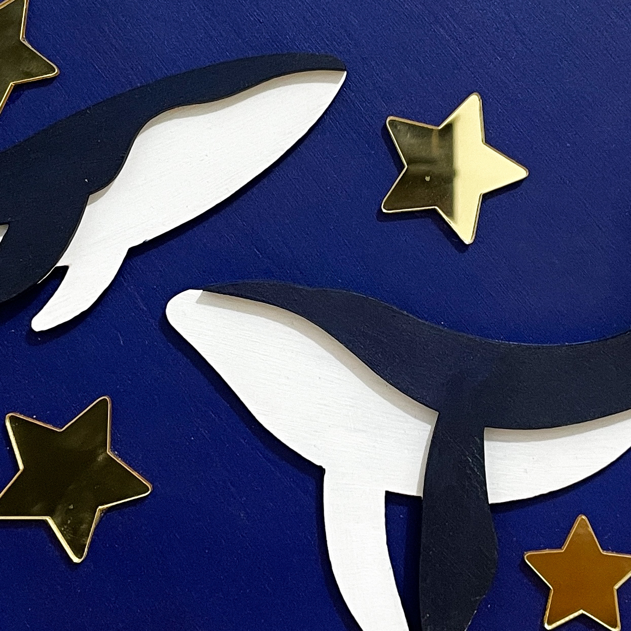 Ballenas bajo la Luna