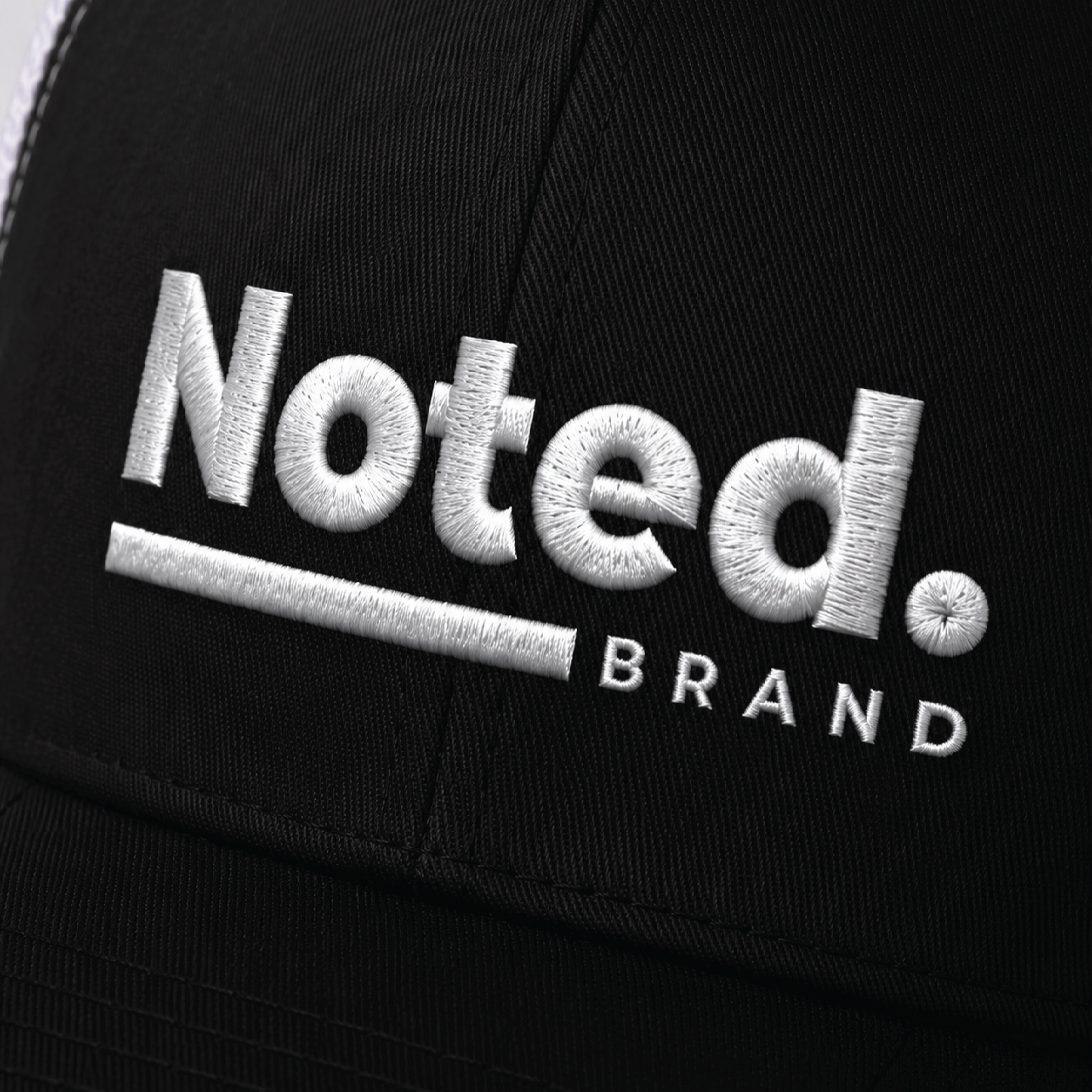 Noted. Trucker Hat