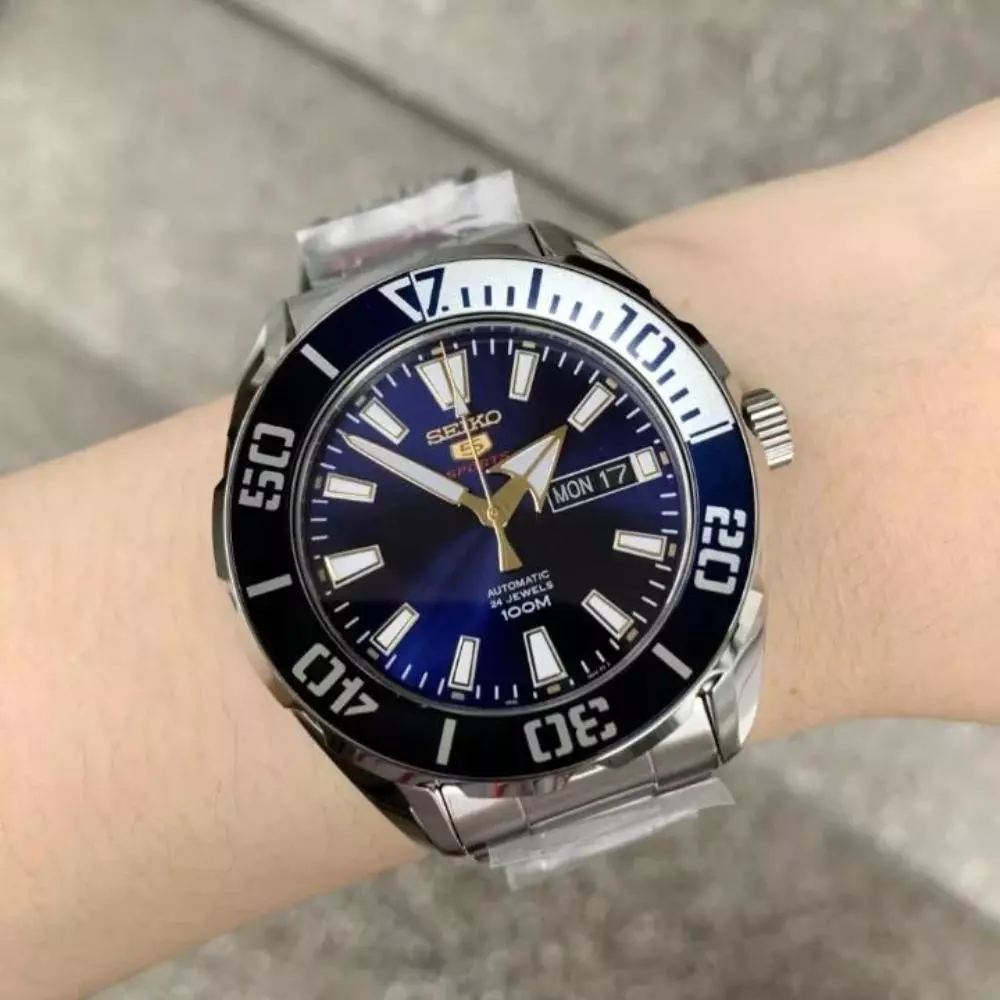 Seiko 5 Automatic Sports Watch — 24 Jewels, Japan, Day/Date, 100M, Silver & Blue Stainless Steel (Men’s)